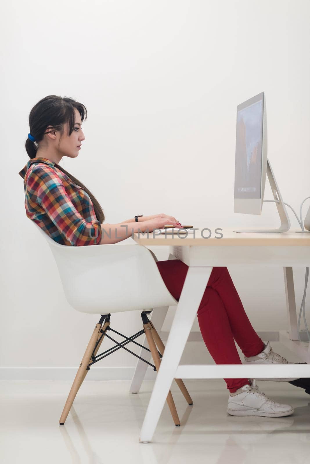 startup business, woman  working on desktop computer by dotshock