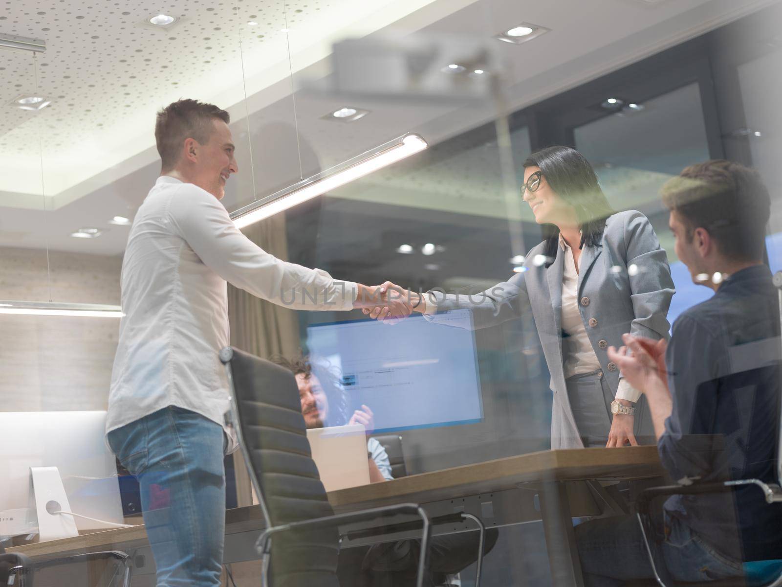 Business Partner Shake Hands on meetinig in modern office building