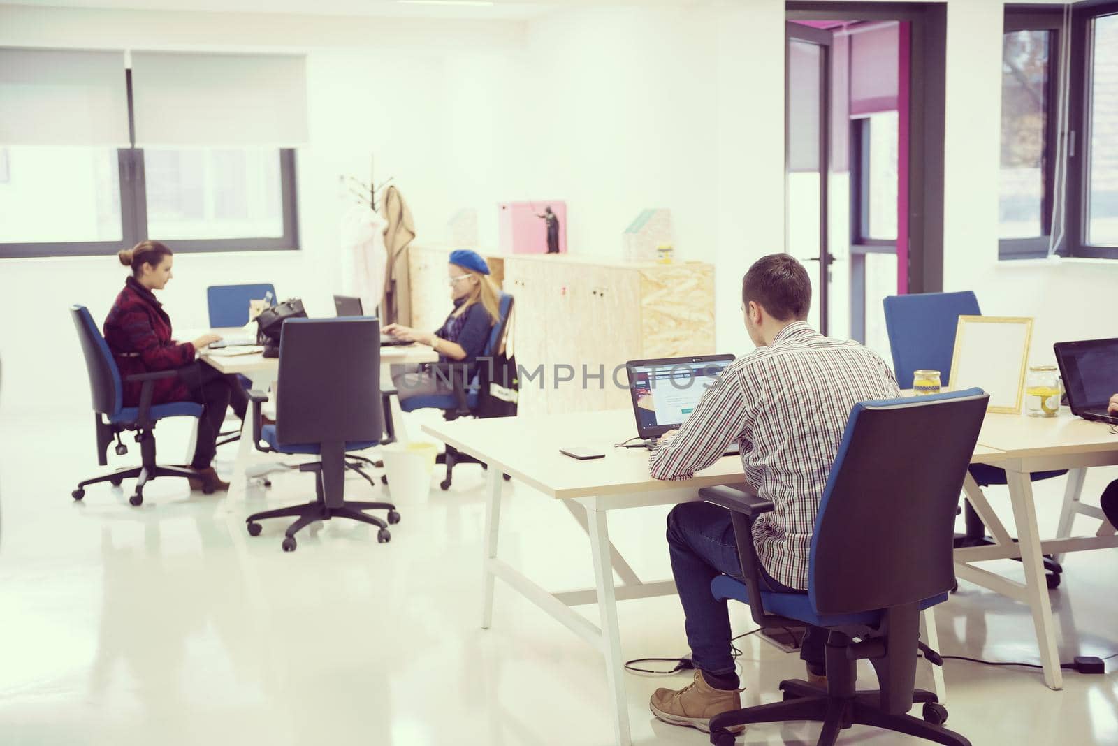 startup business people group at office by dotshock
