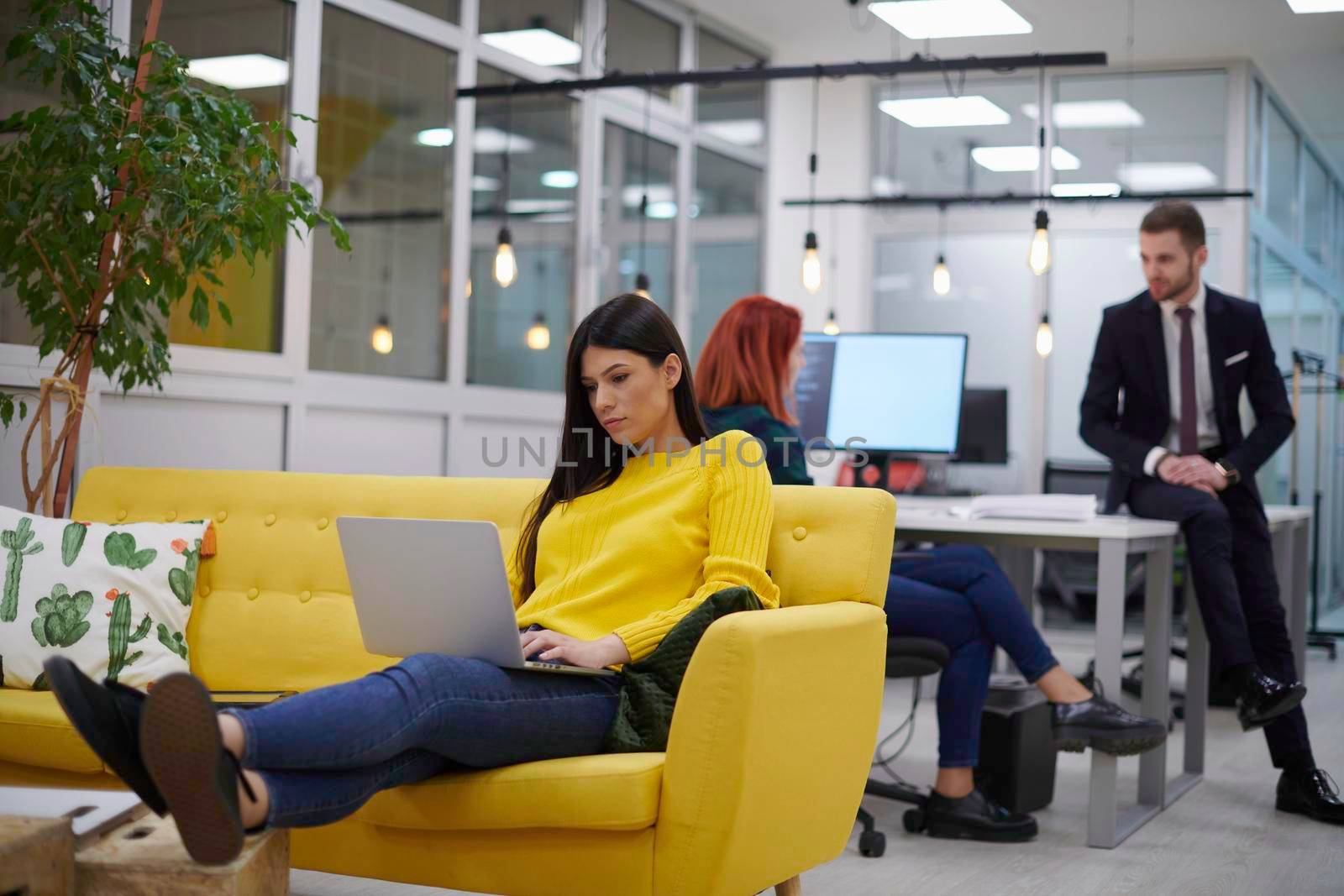 casual business woman at work  in creative modern coworking startup open space office