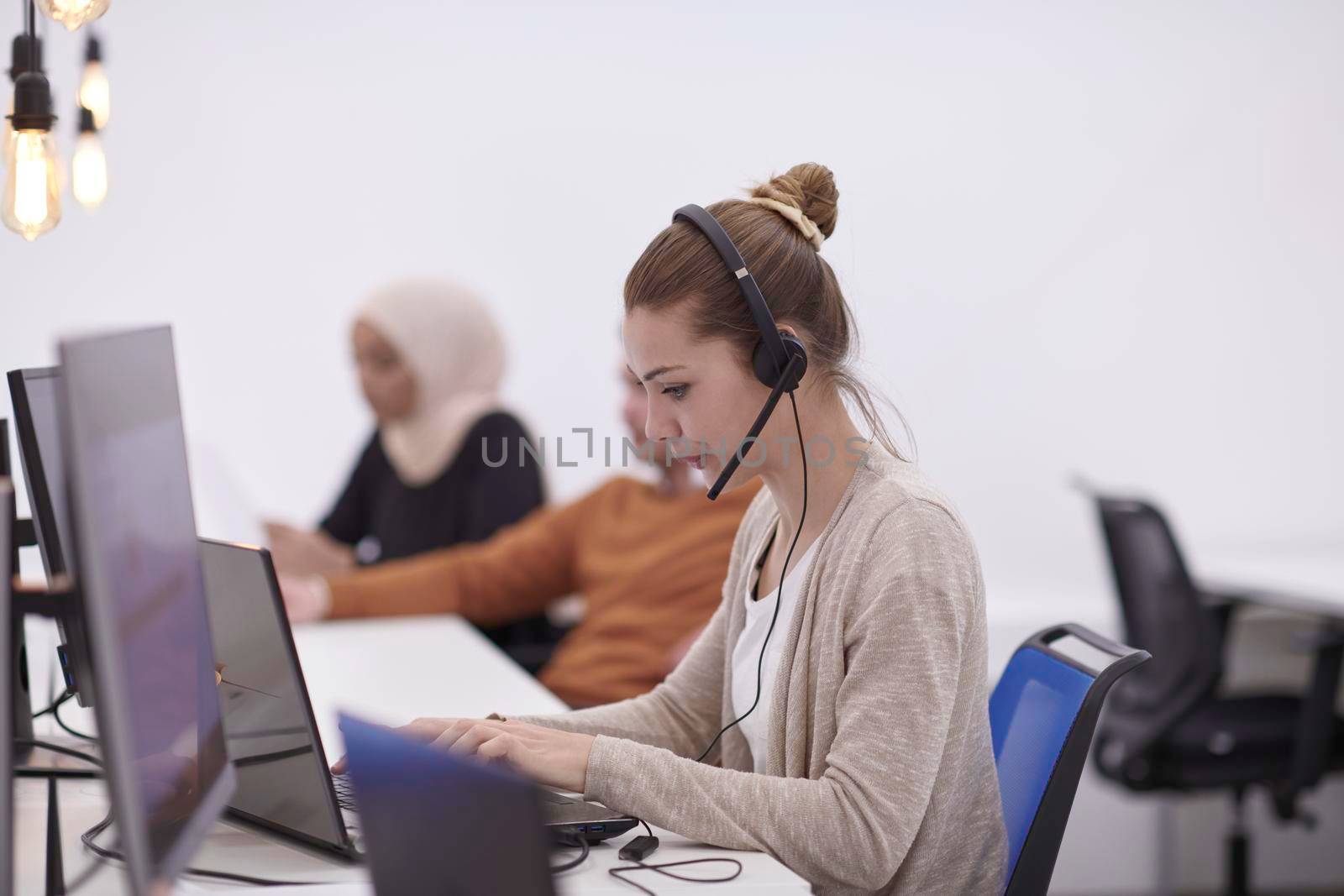 casual business woman at work  in creative modern coworking startup open space office