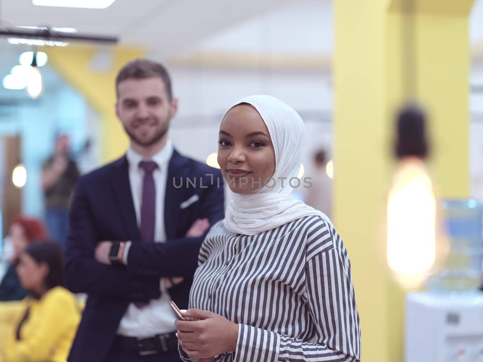 multiethnic startup business people team portrait at modern coworking open space office group of employees working in background