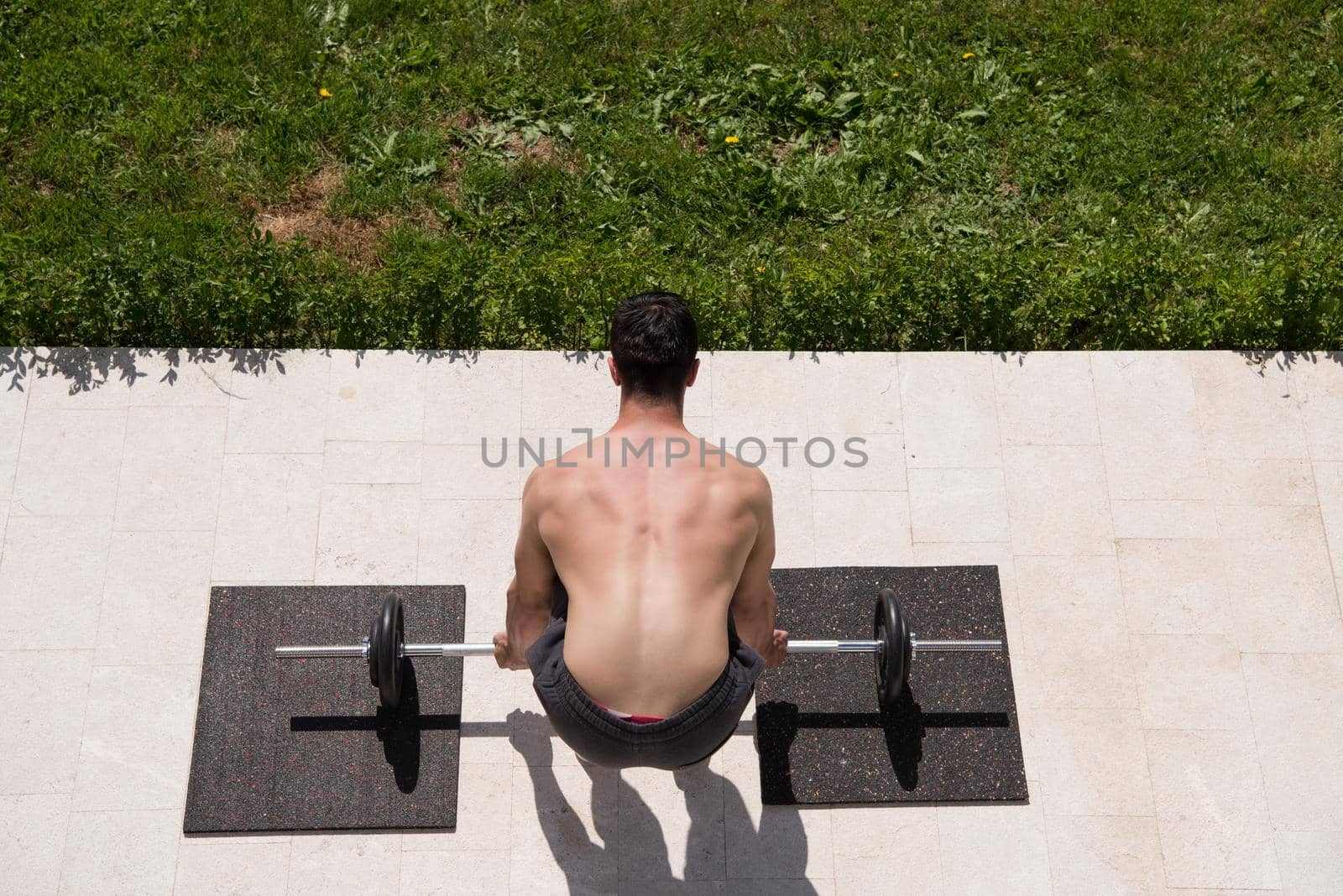 man doing morning exercises by dotshock