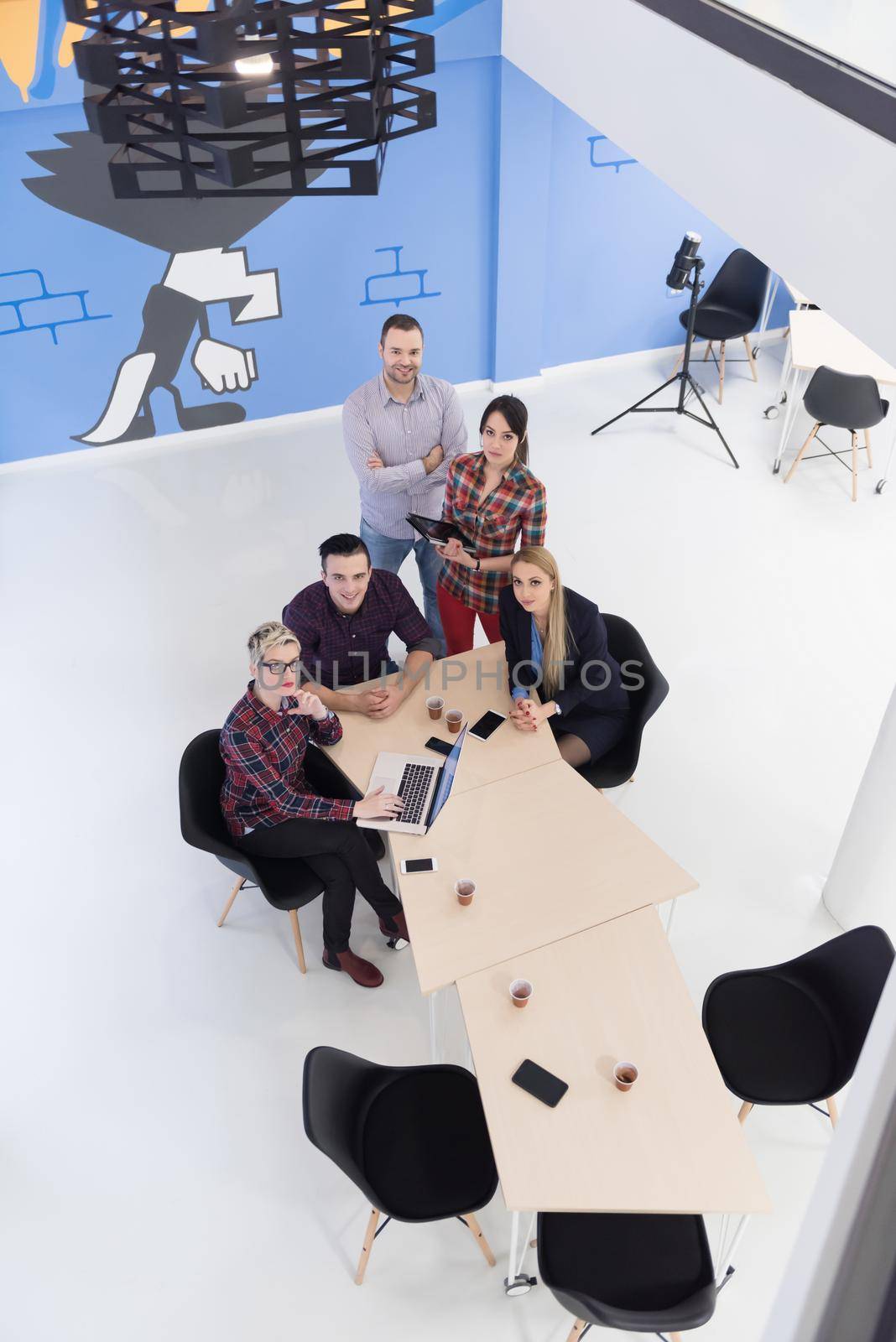 aerial view of business people group on meeting by dotshock