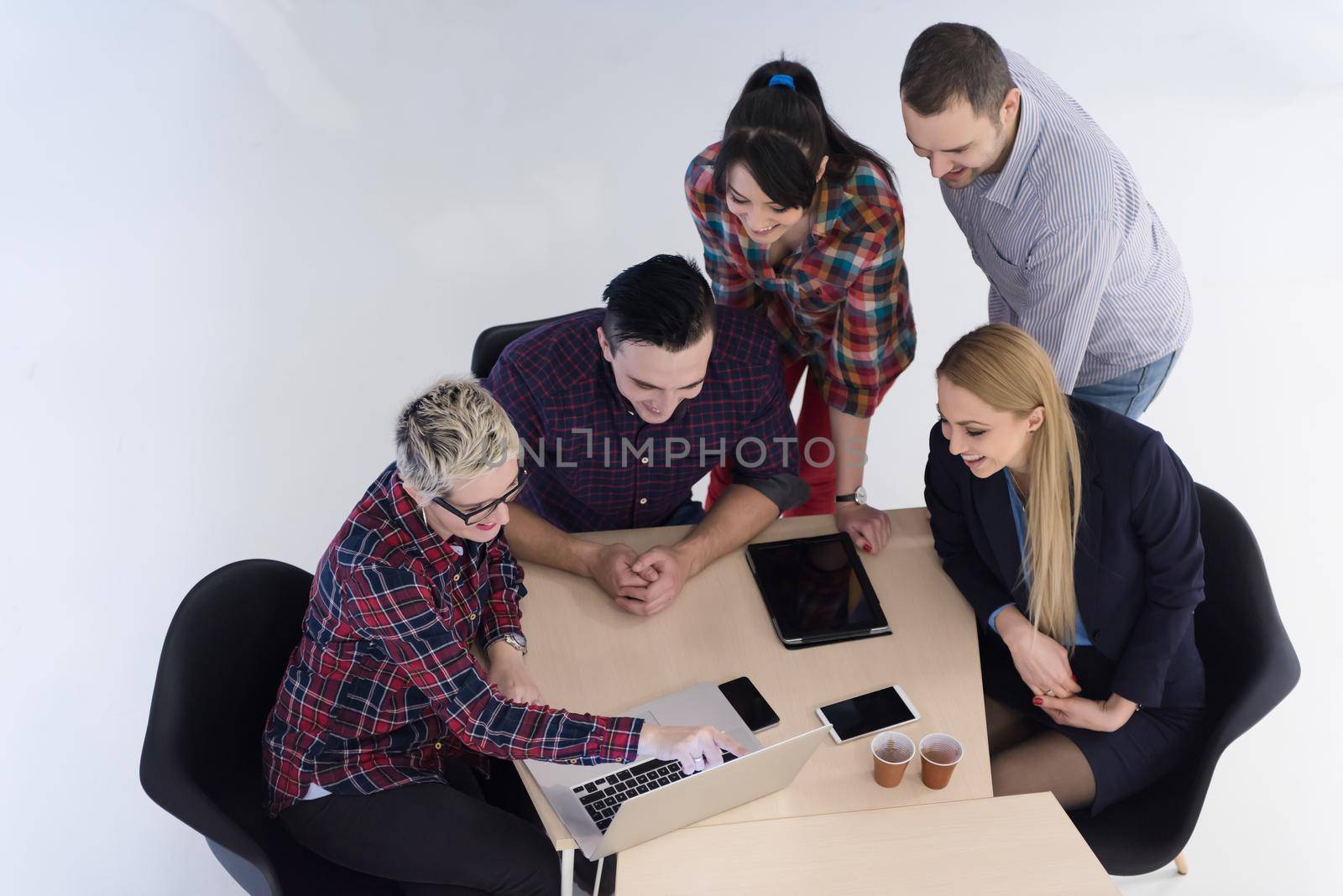 top view of multi ethnic startup business people group on brainstorming meeting in modern bright office interior