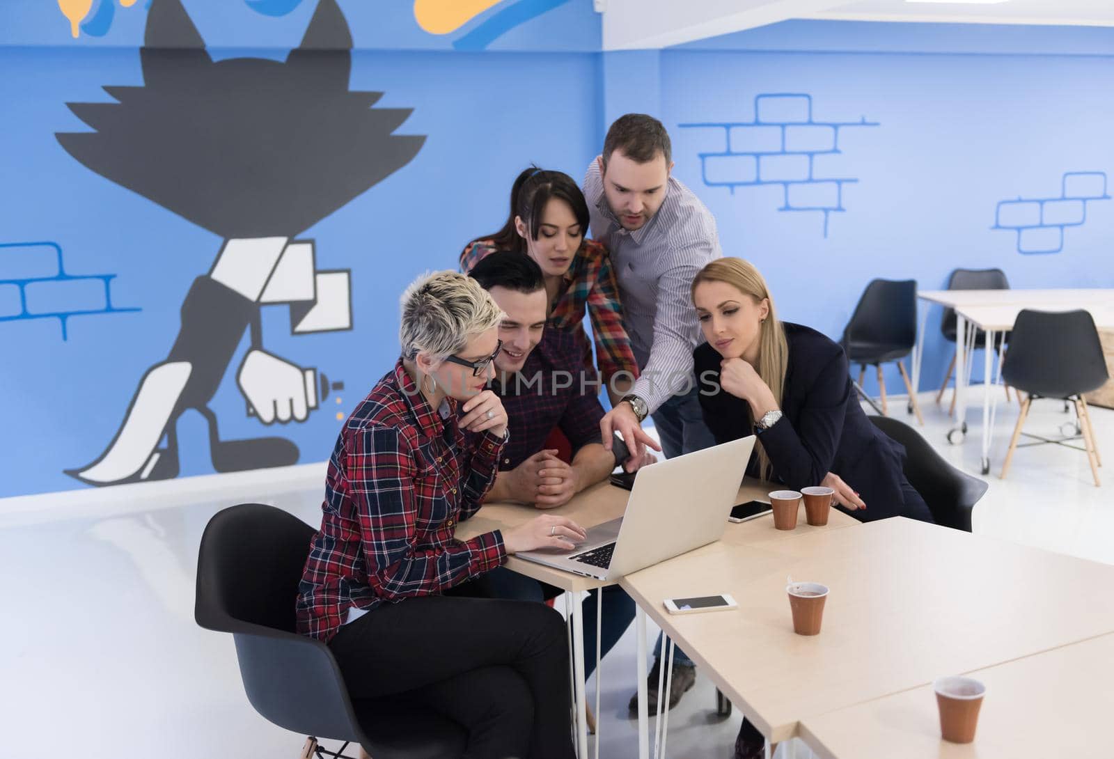 startup business team on meeting at modern office by dotshock