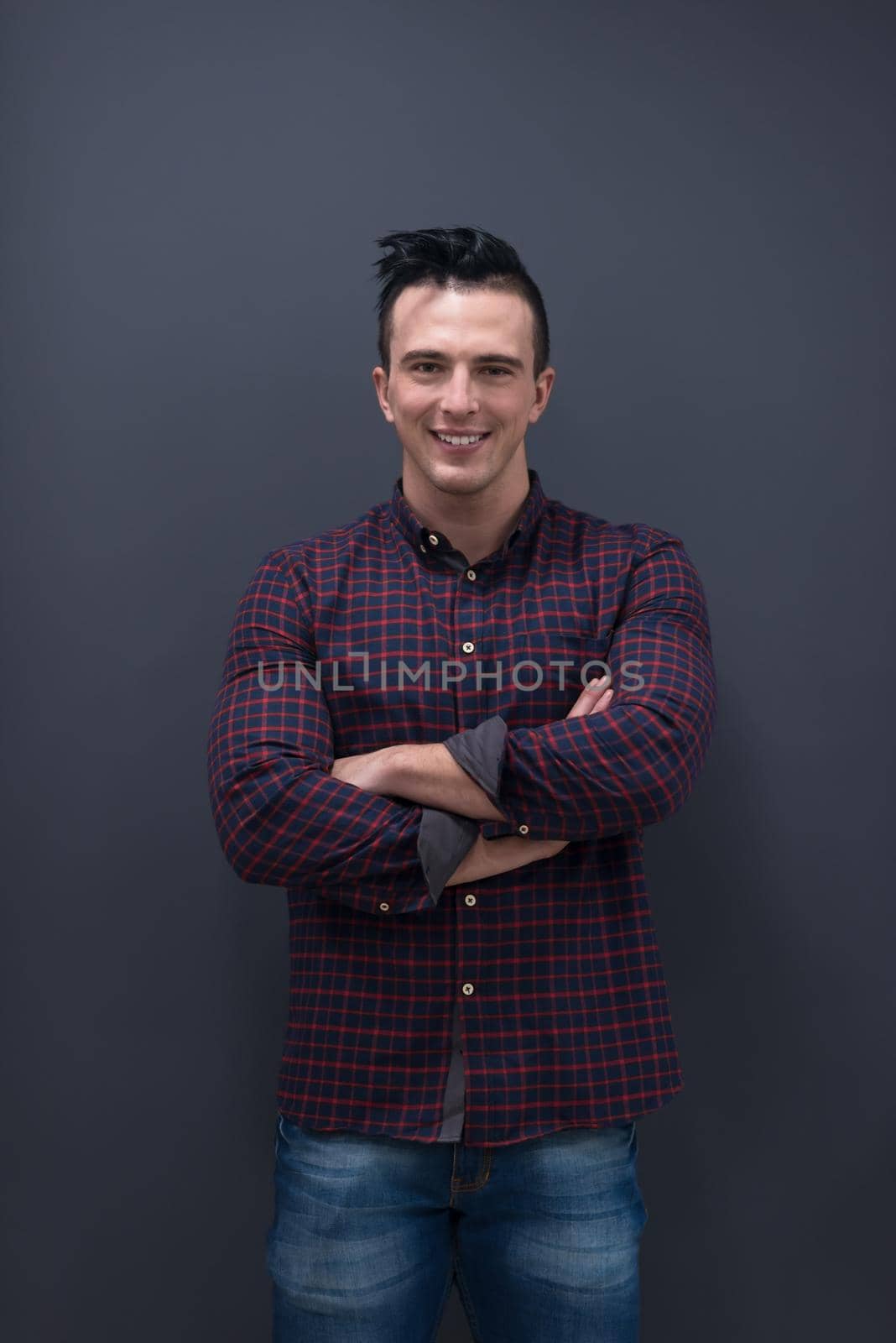 portrait of young startup business man in plaid shirt by dotshock