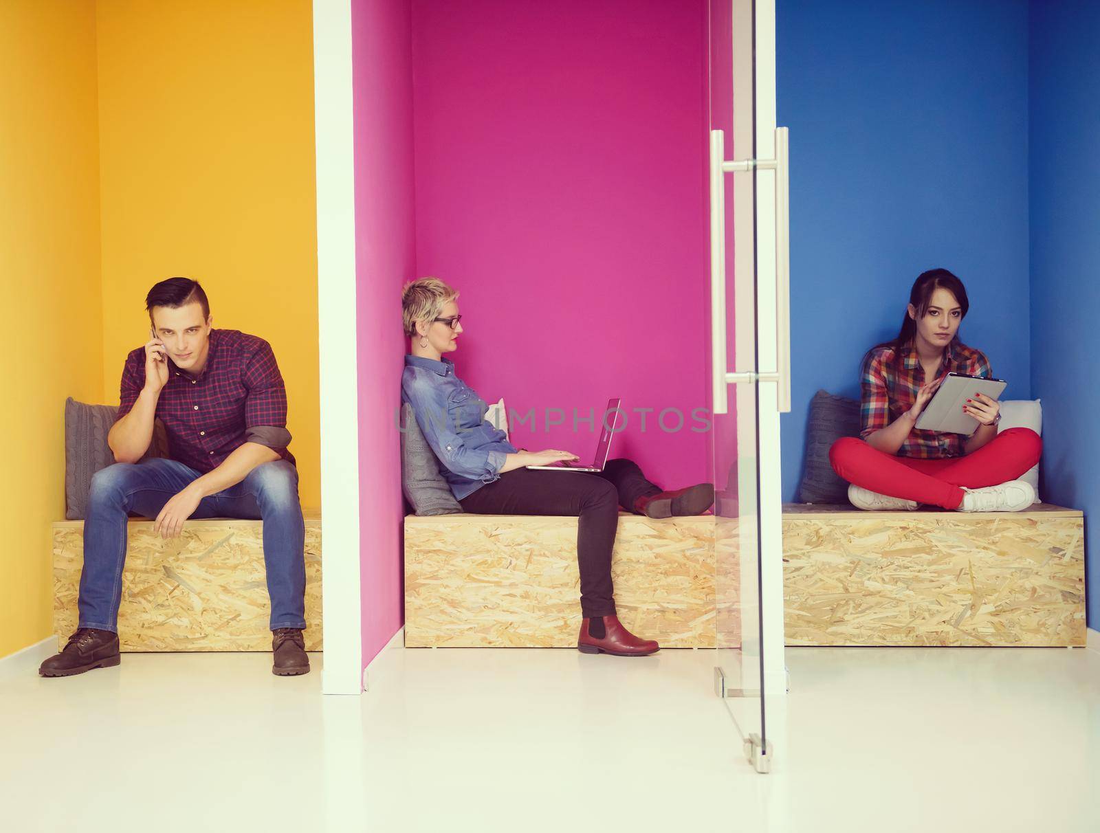 group of business people in creative working  space by dotshock