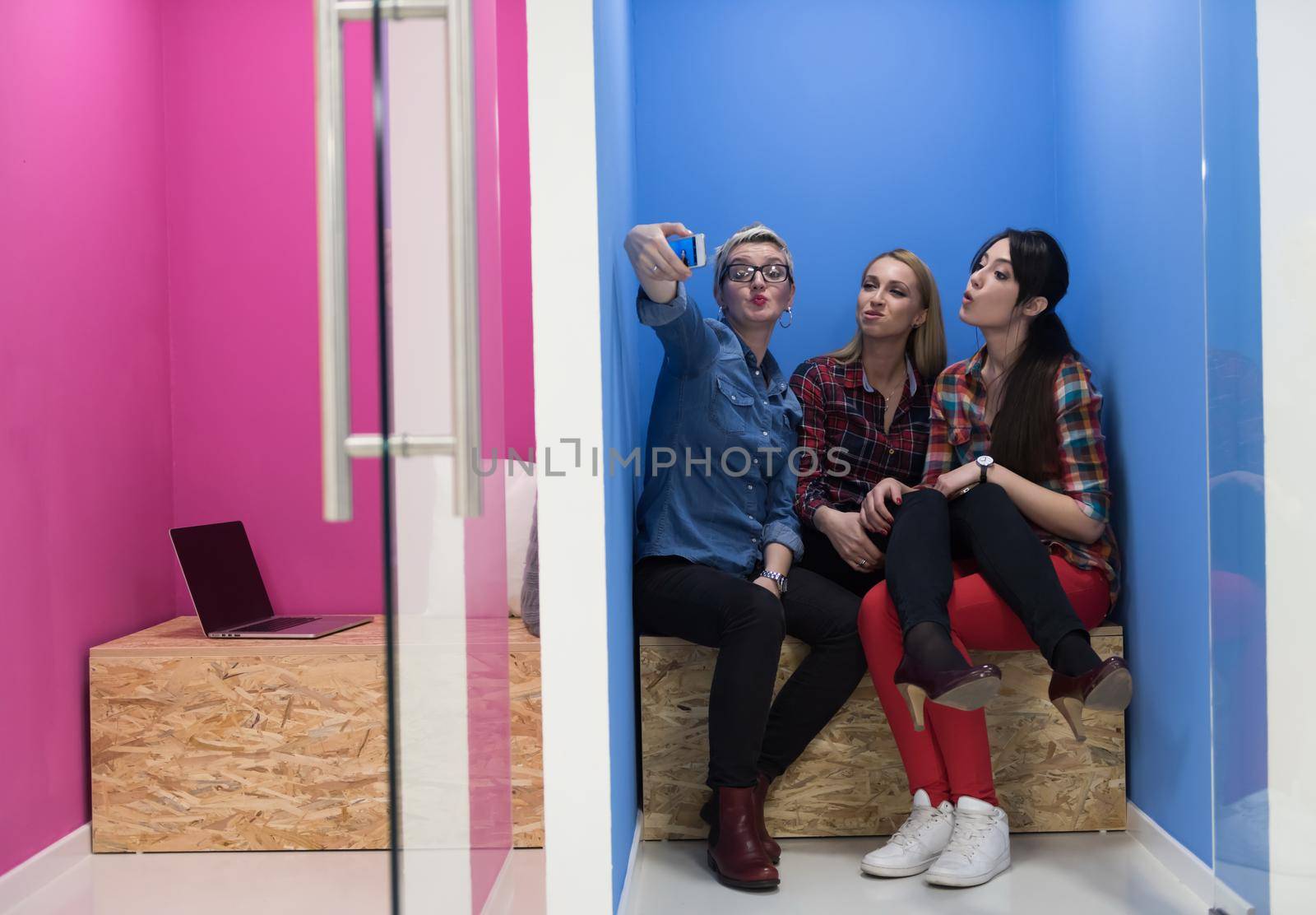 group of business people in creative working  space by dotshock