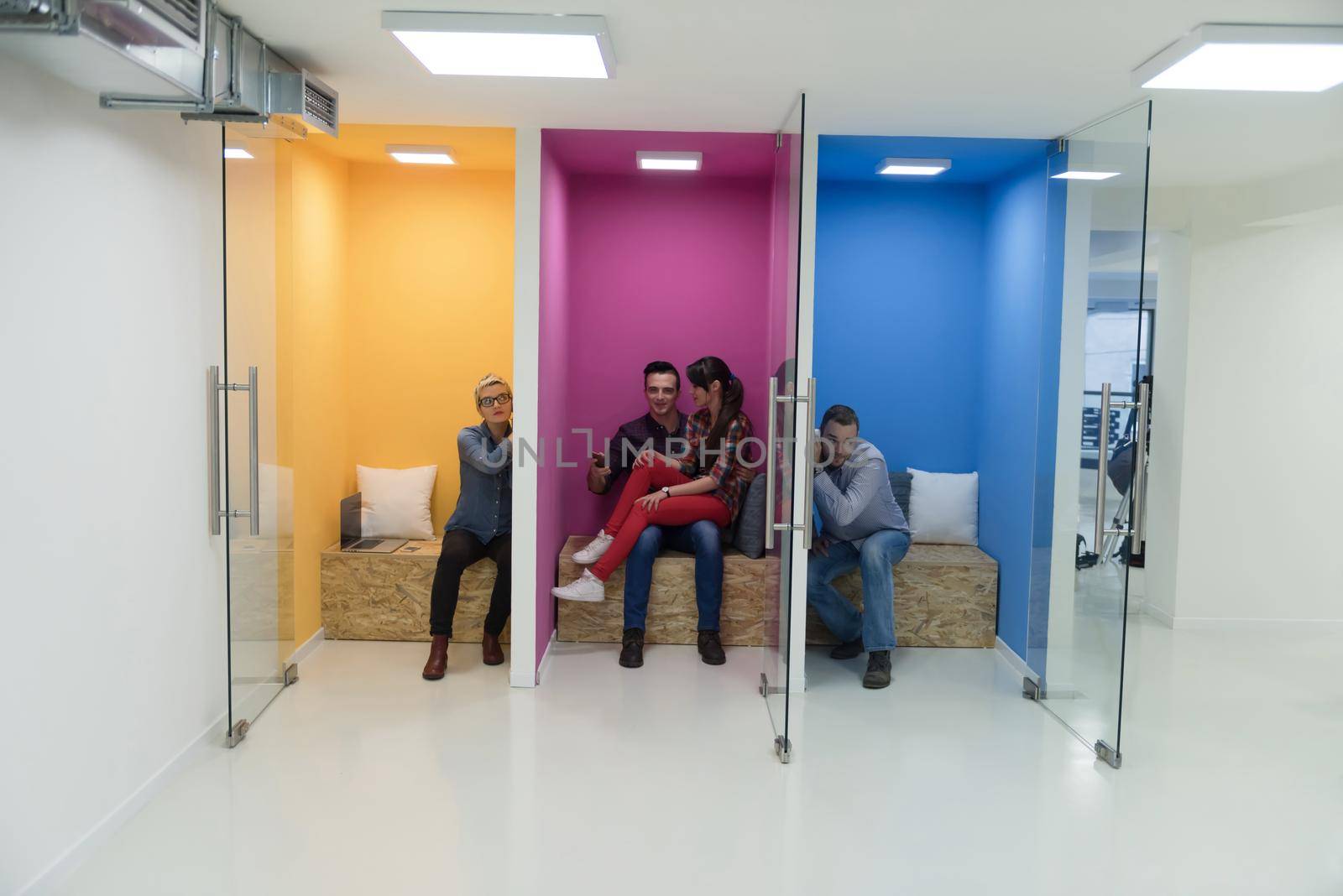 group of business people in creative working  space by dotshock