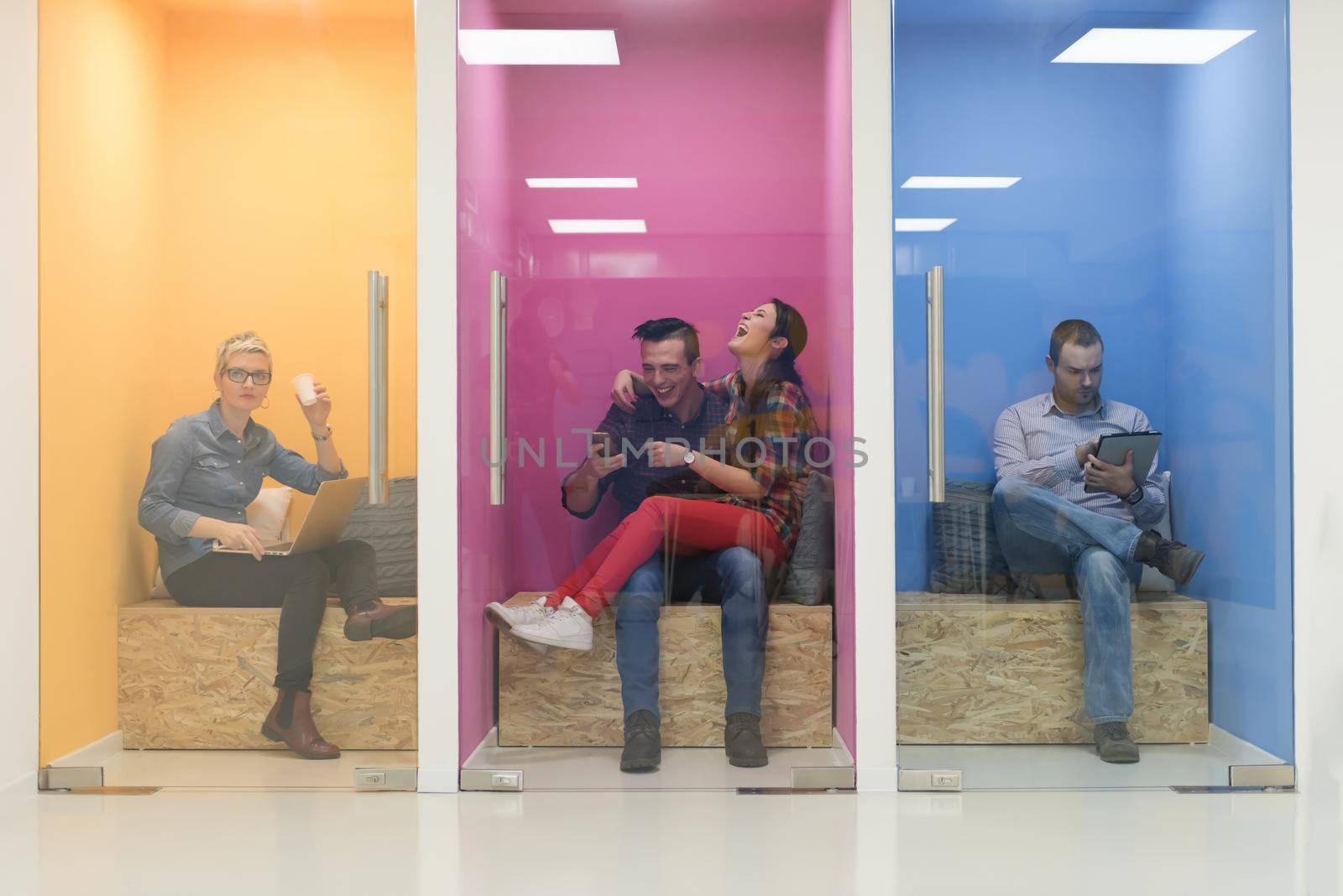 group of business people in creative working  space by dotshock