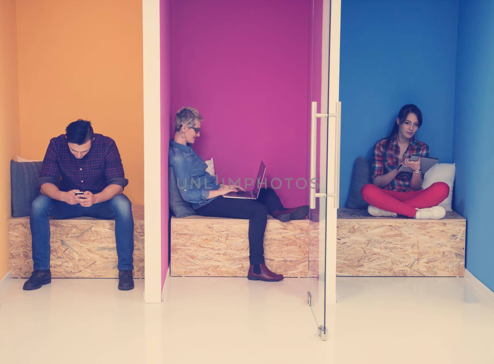 group of business people in creative working  space by dotshock