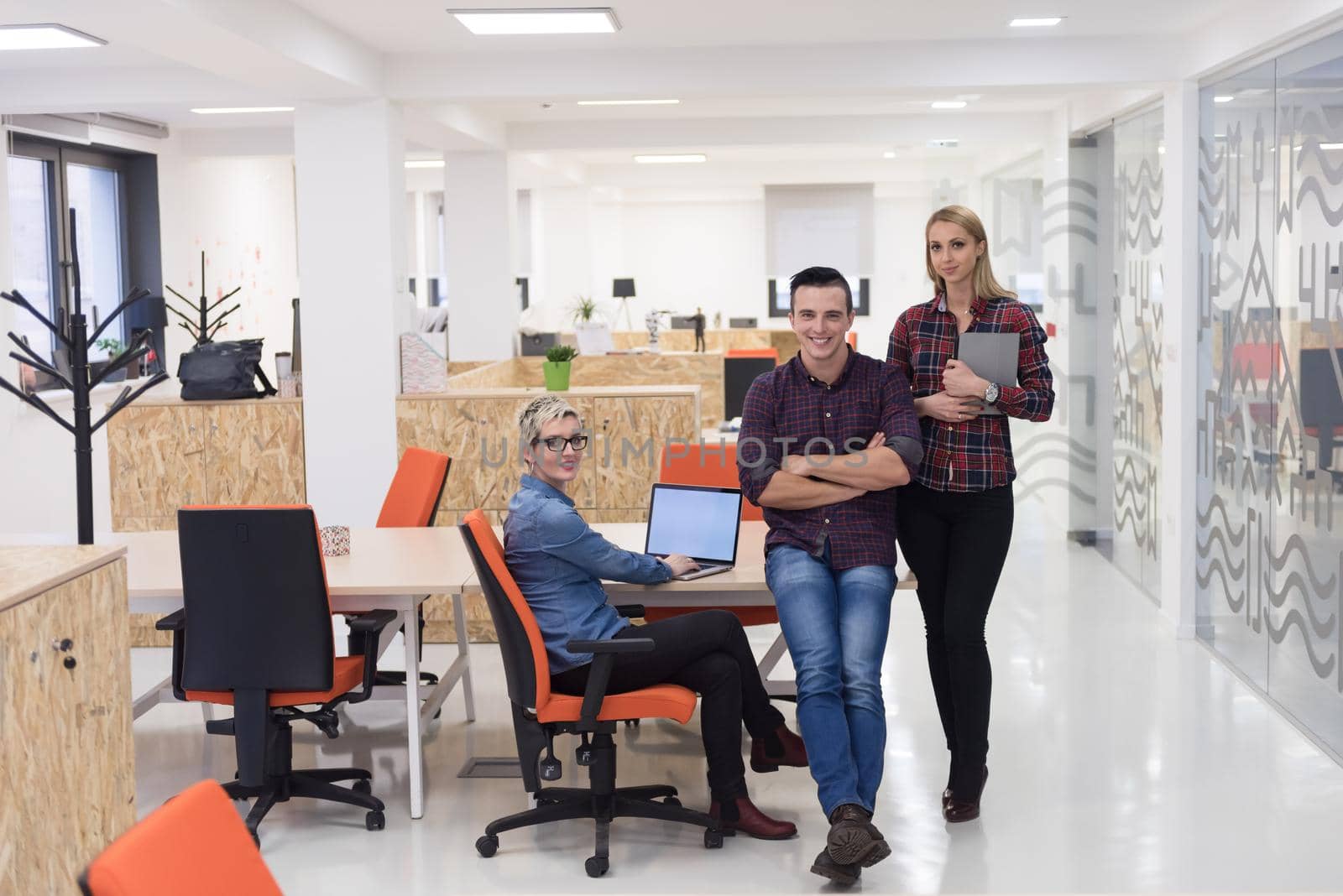 portrait of creative business people group in modern startup office interior