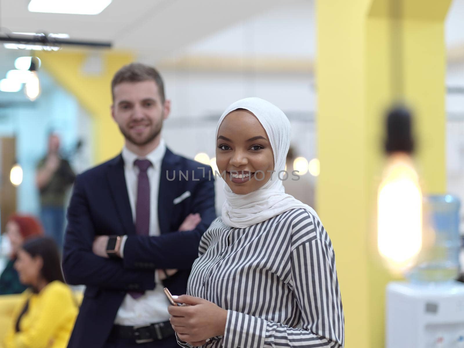 multiethnic startup business people team portrait at modern coworking open space office group of employees working in background