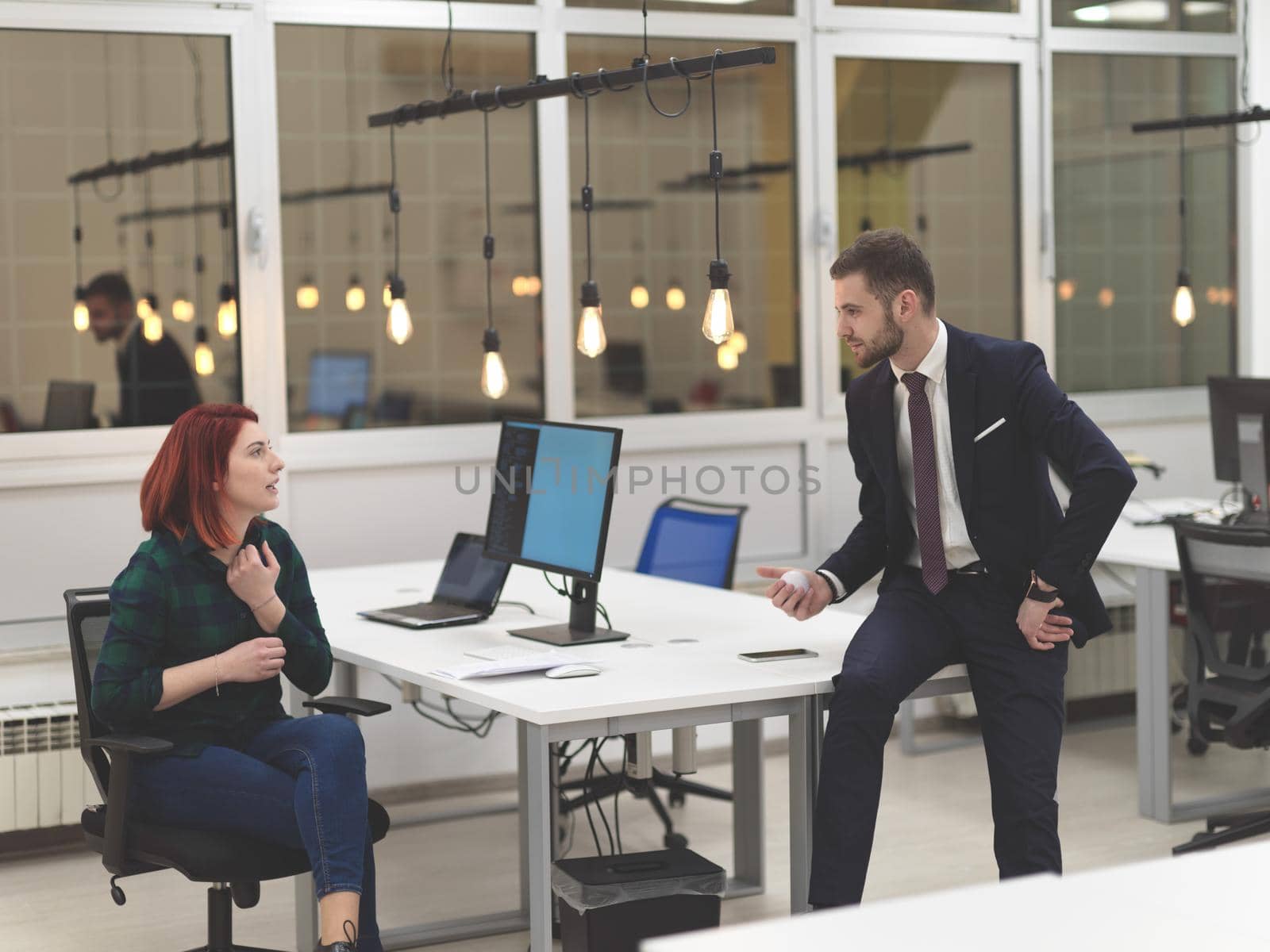 business couple as a small team working together on project at modern startup coworking open space office