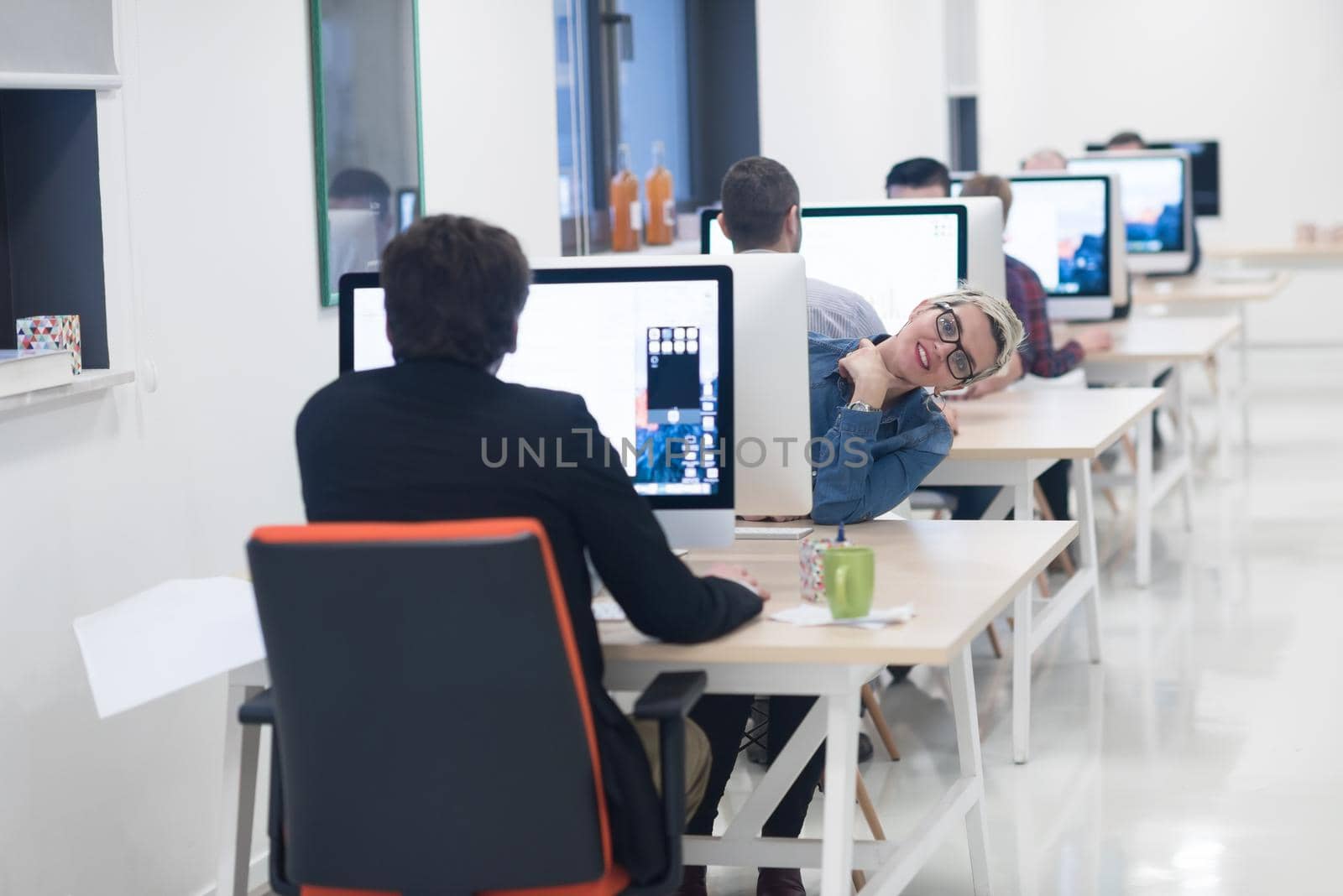 startup business, woman  working on desktop computer by dotshock