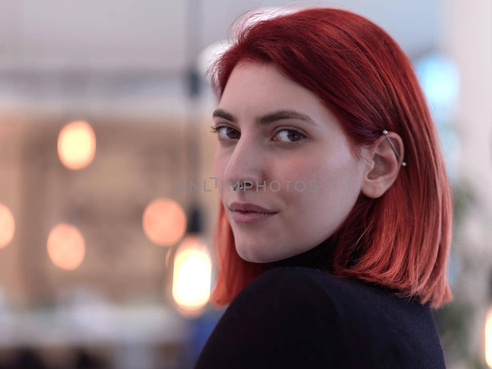 redhead business woman portrait as influencer in creative modern coworking startup open space office