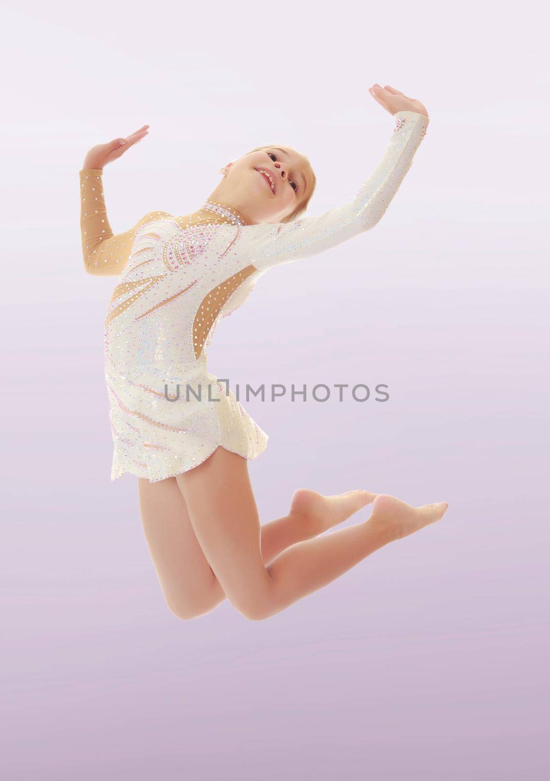 Little gymnast jumping by kolesnikov_studio