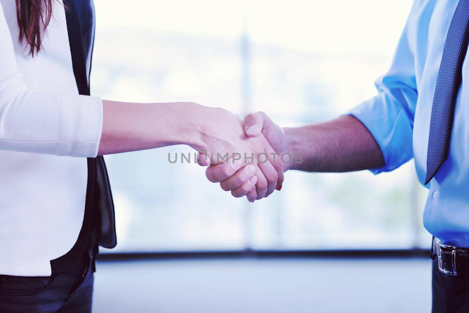 Group of happy young  business people in a meeting at office