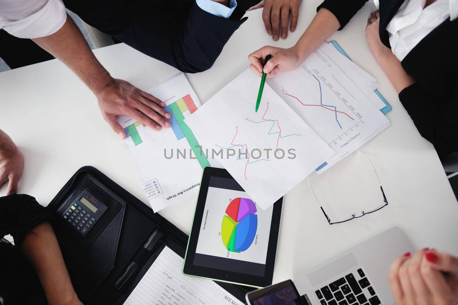 Group of happy young  business people in a meeting at office