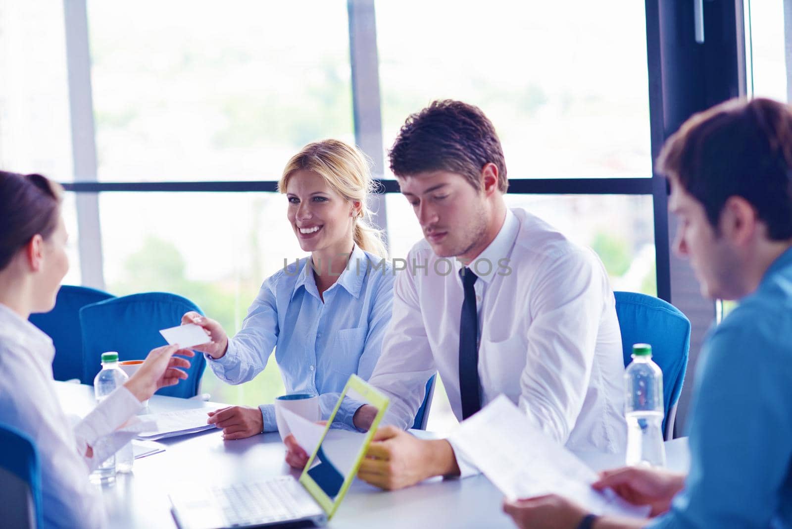 business people in a meeting at office by dotshock