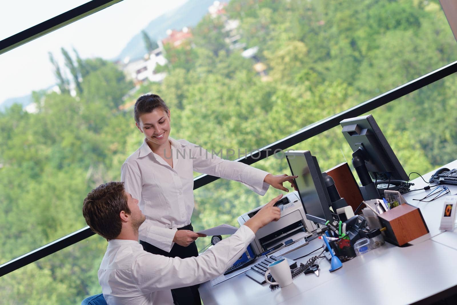 business people in a meeting at office by dotshock