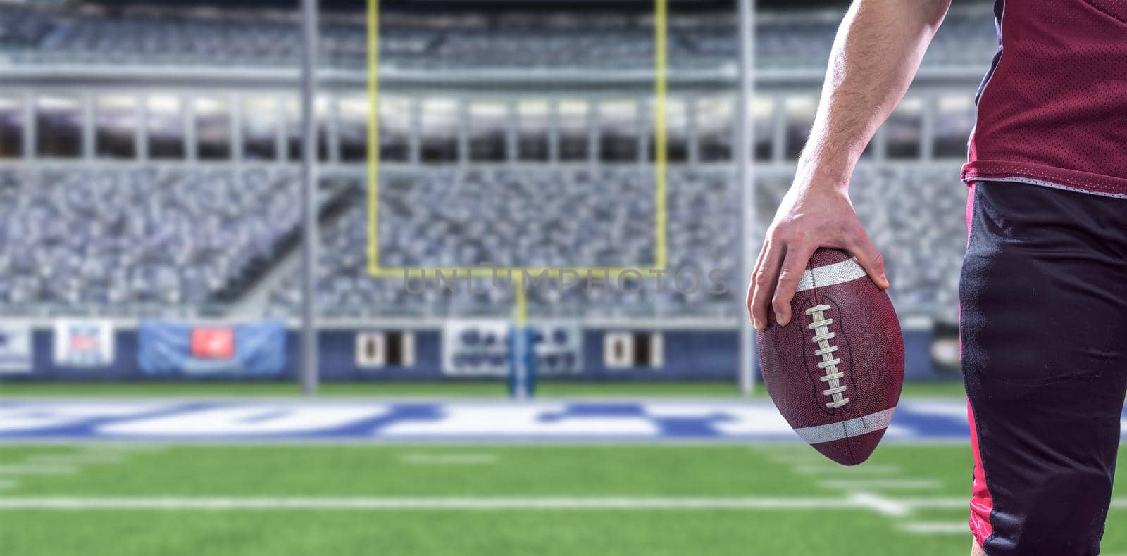 closeup American Football Player isolated on big modern stadium by dotshock