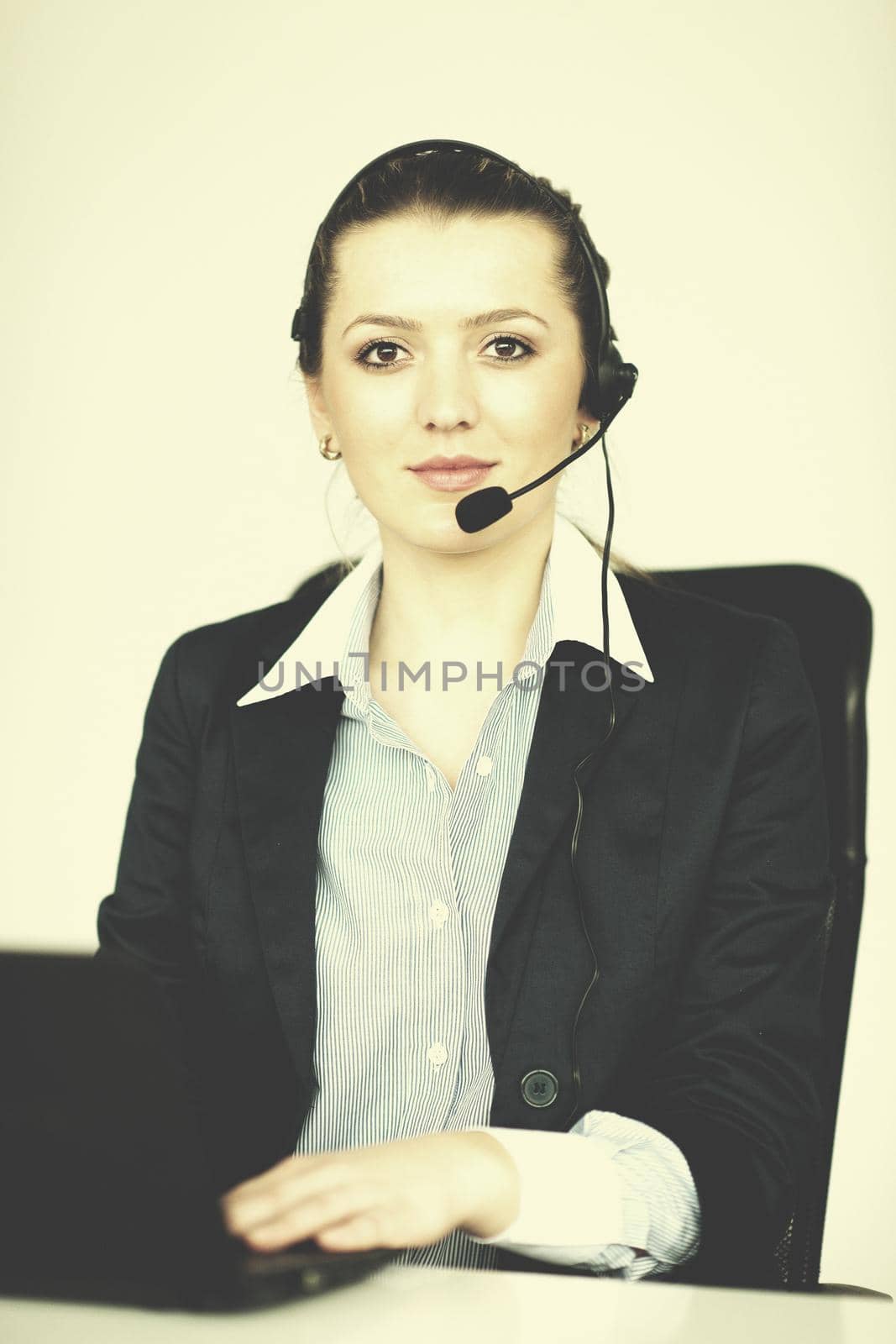 business woman group with headphones by dotshock
