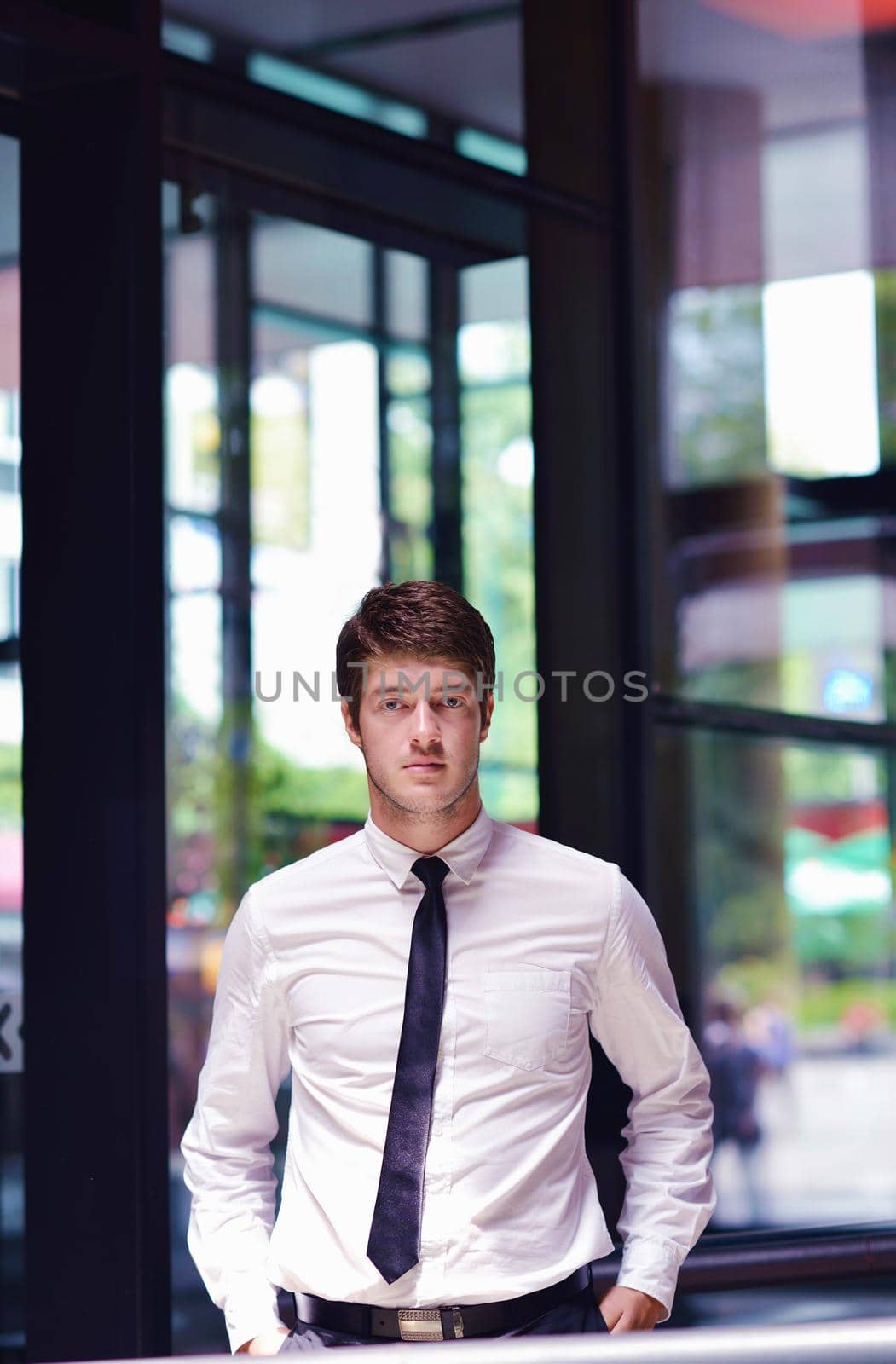 happy young business  man work in modern office on computer