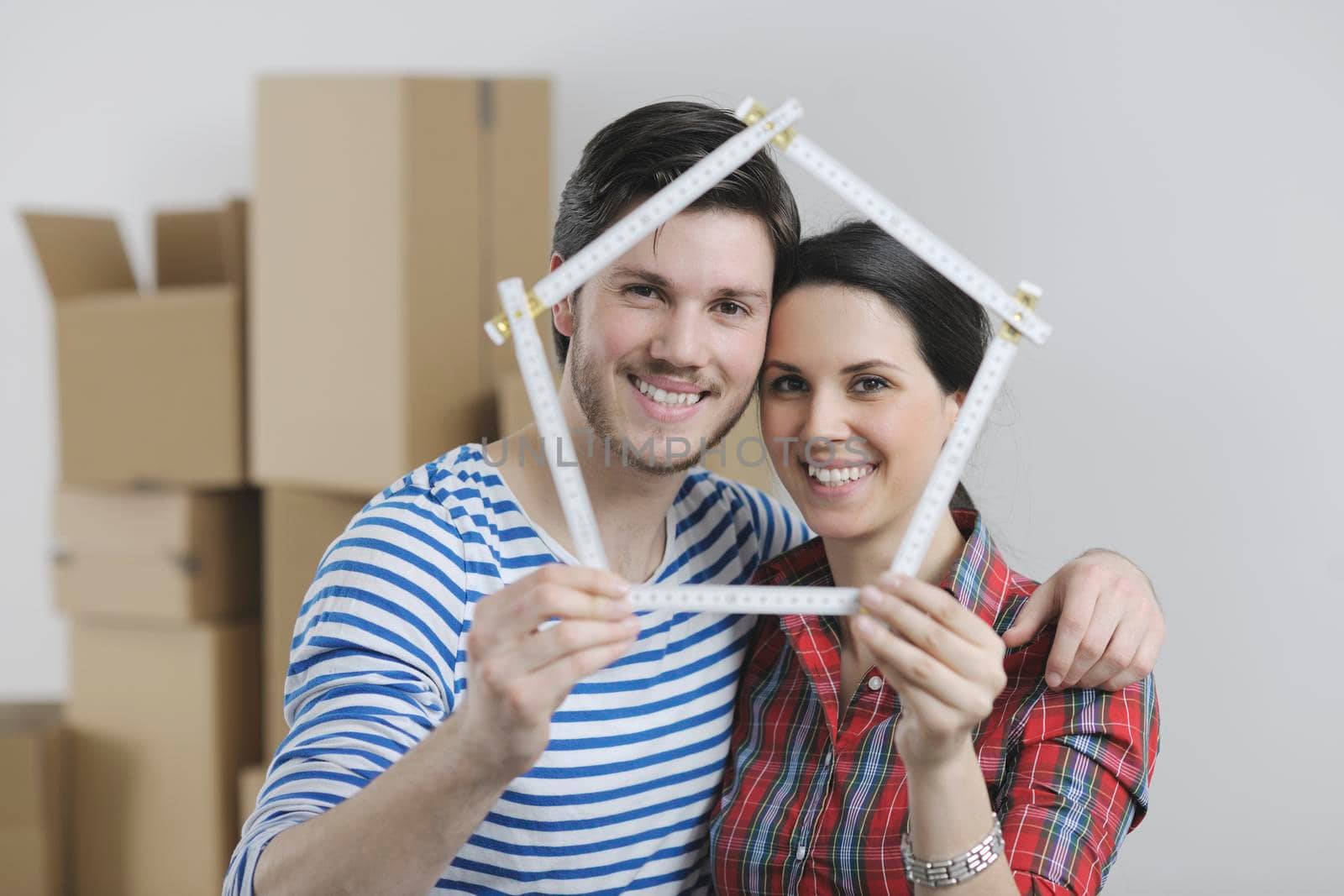 happy Young couple moving in new home