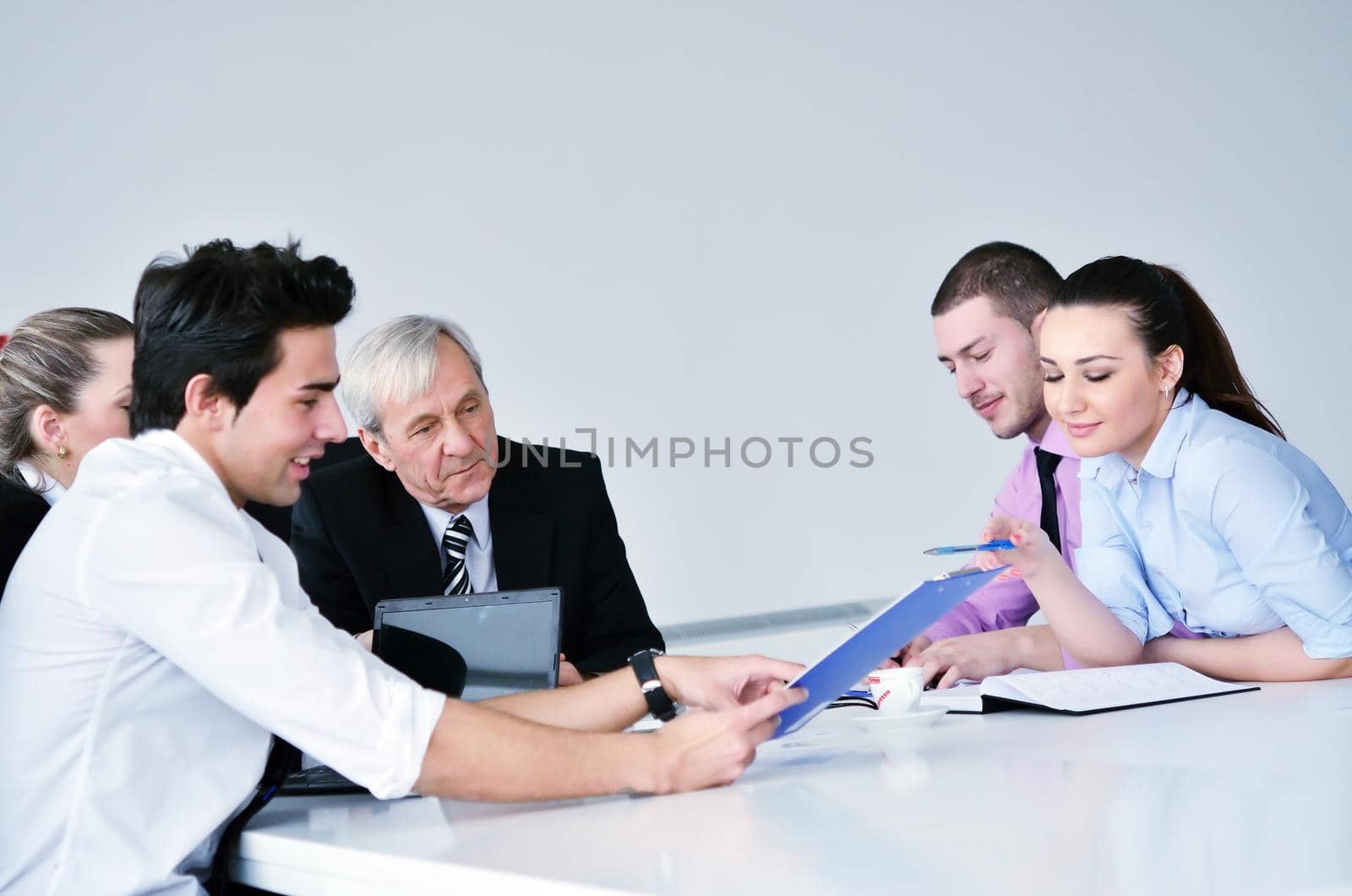 business people group on meeting by dotshock