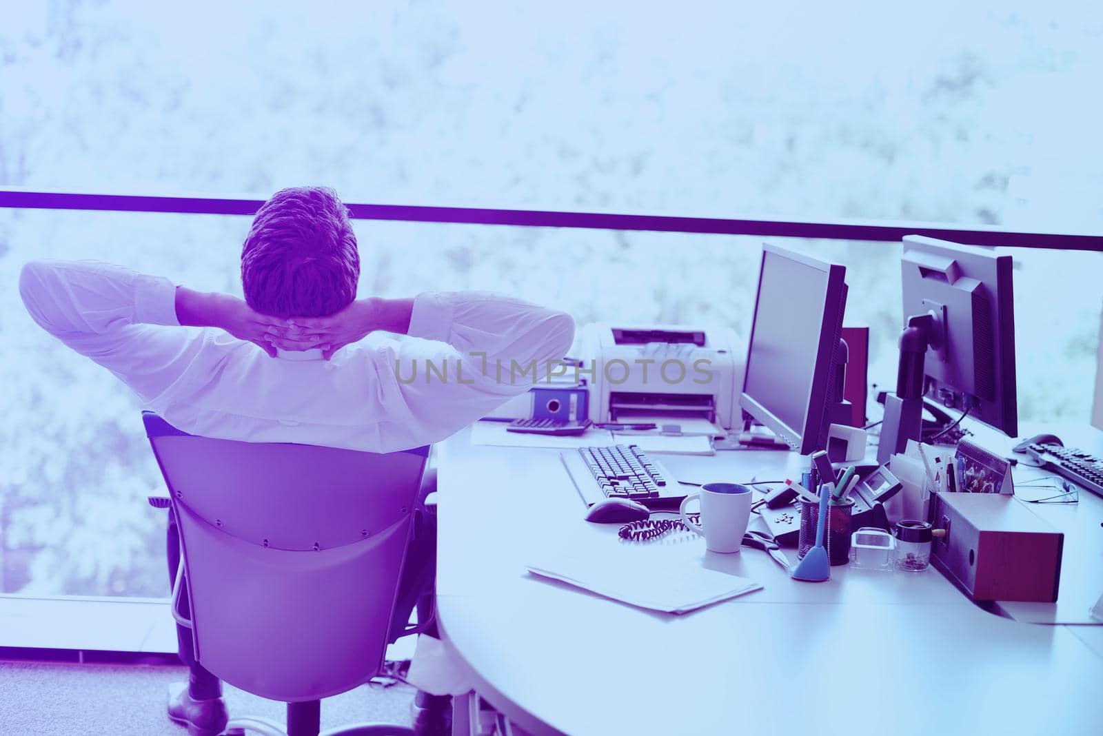 happy young business  man work in modern office on computer