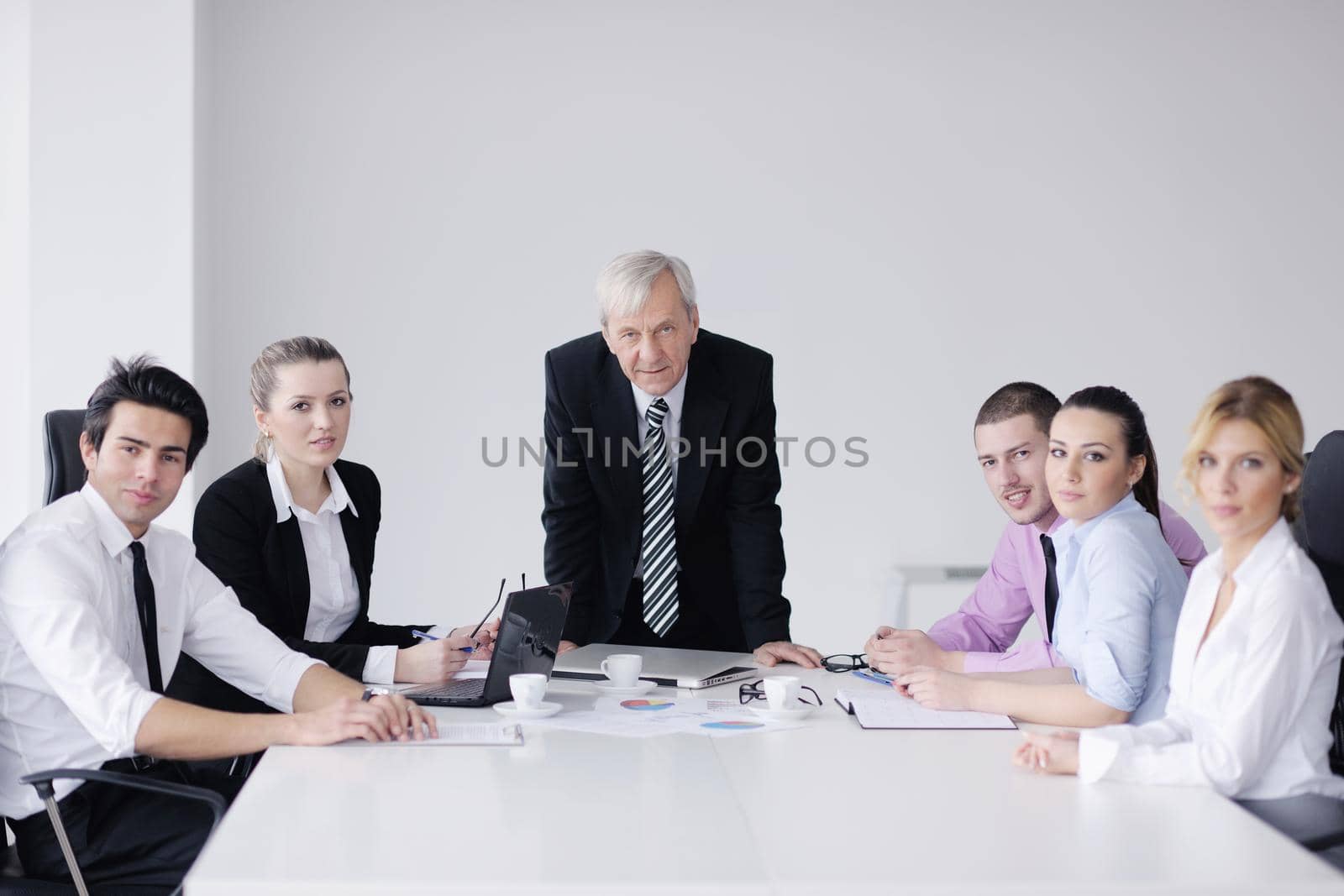 business people group on meeting by dotshock