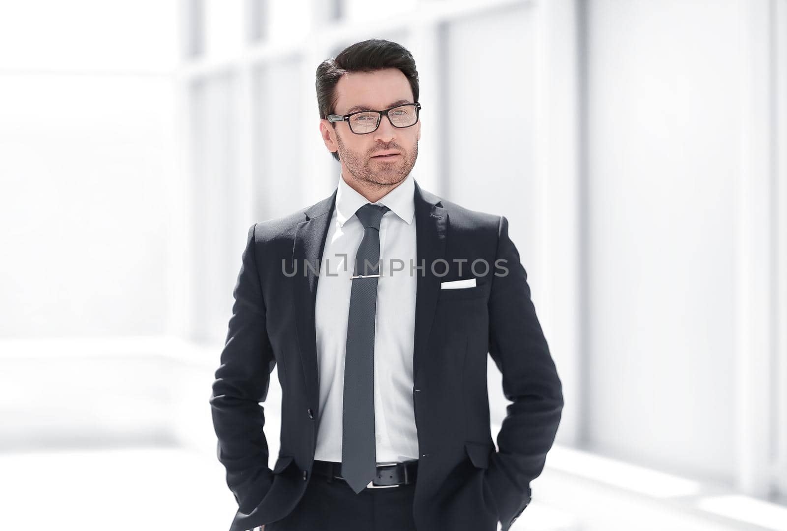 beautiful businessman in the office background.business people