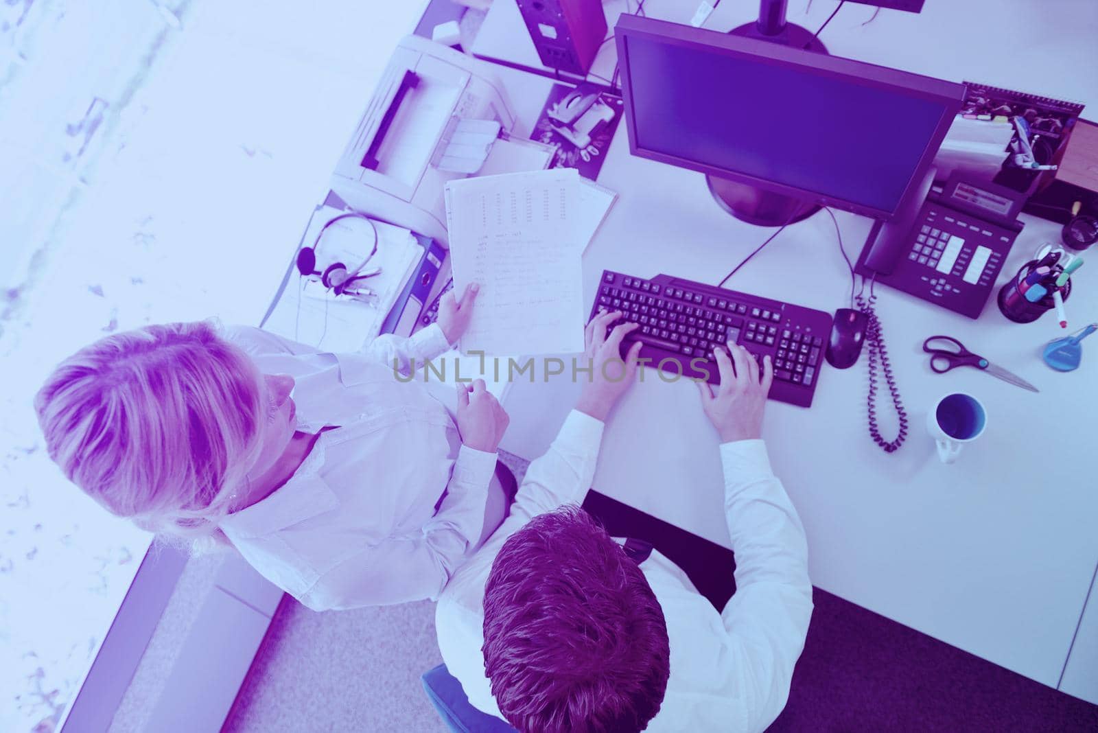 Group of happy young  business people in a meeting at office