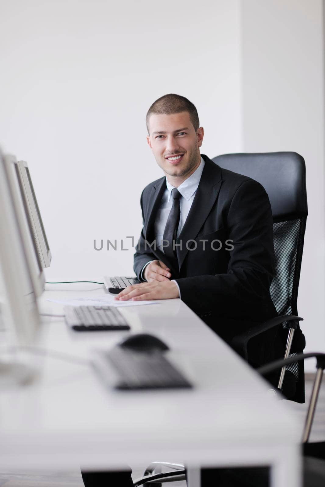 Portrait of a handsome young business man  at office meeting