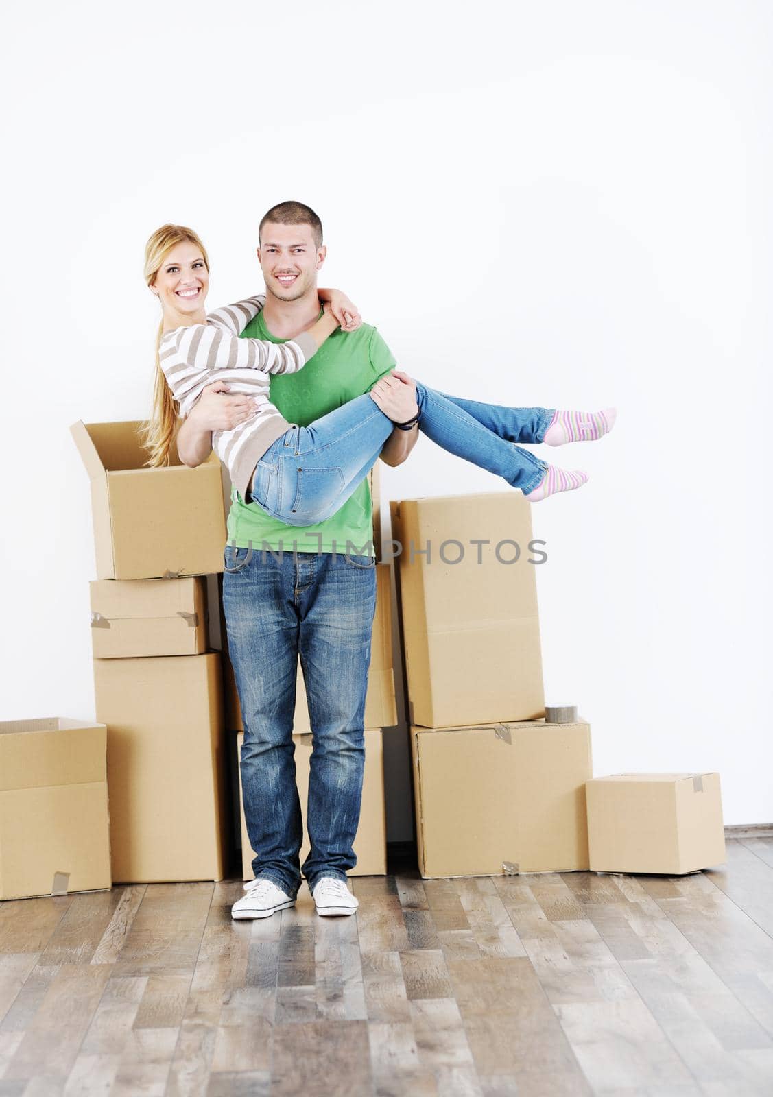 happy Young couple moving in new house