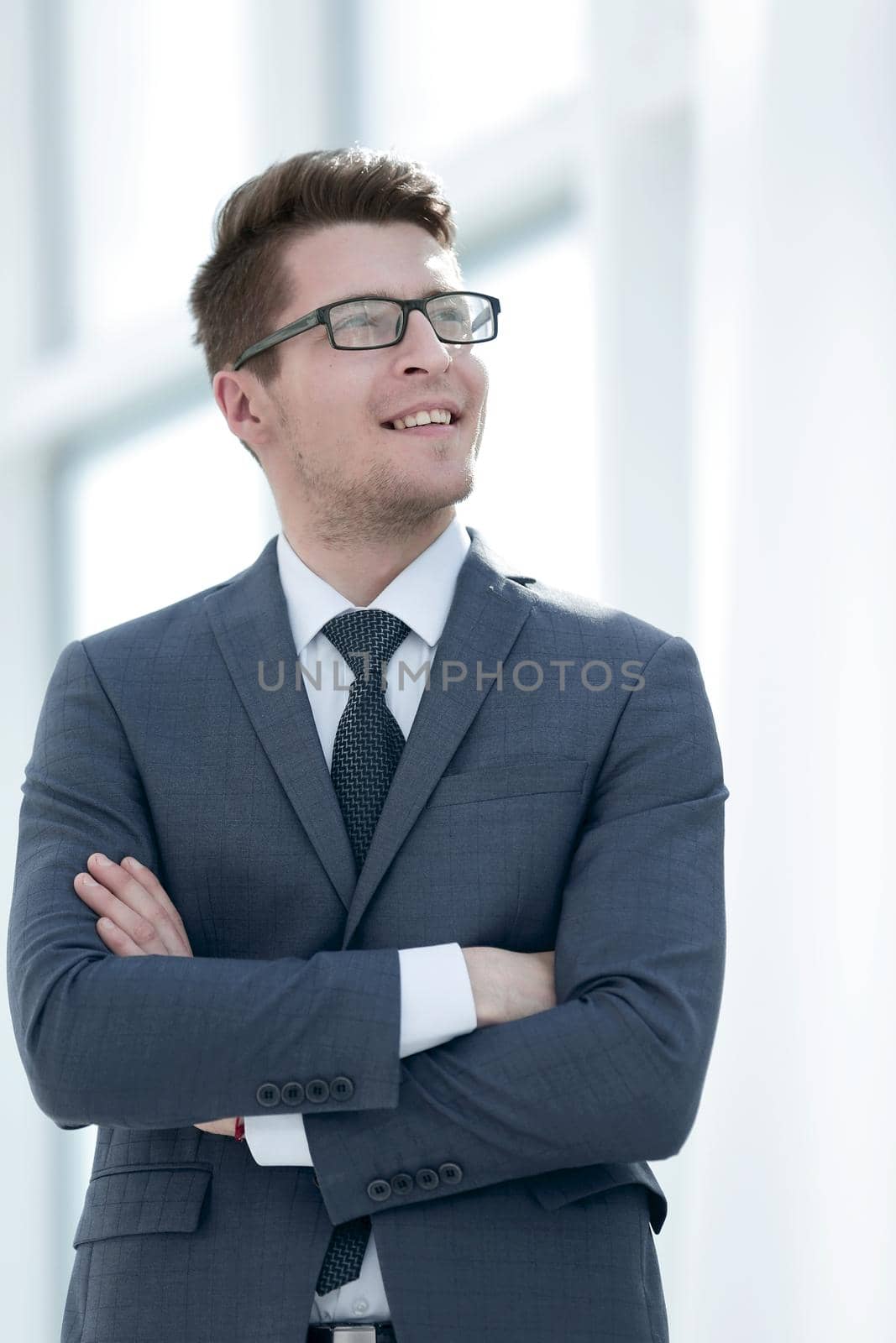 portrait of a modern young businessman. by asdf