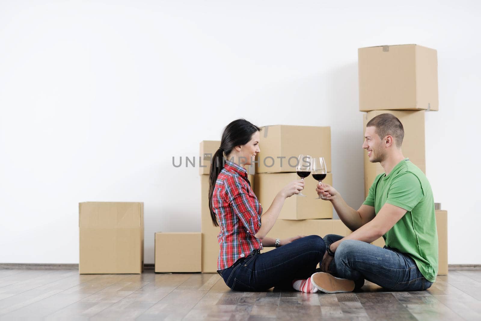 happy Young couple moving in new house