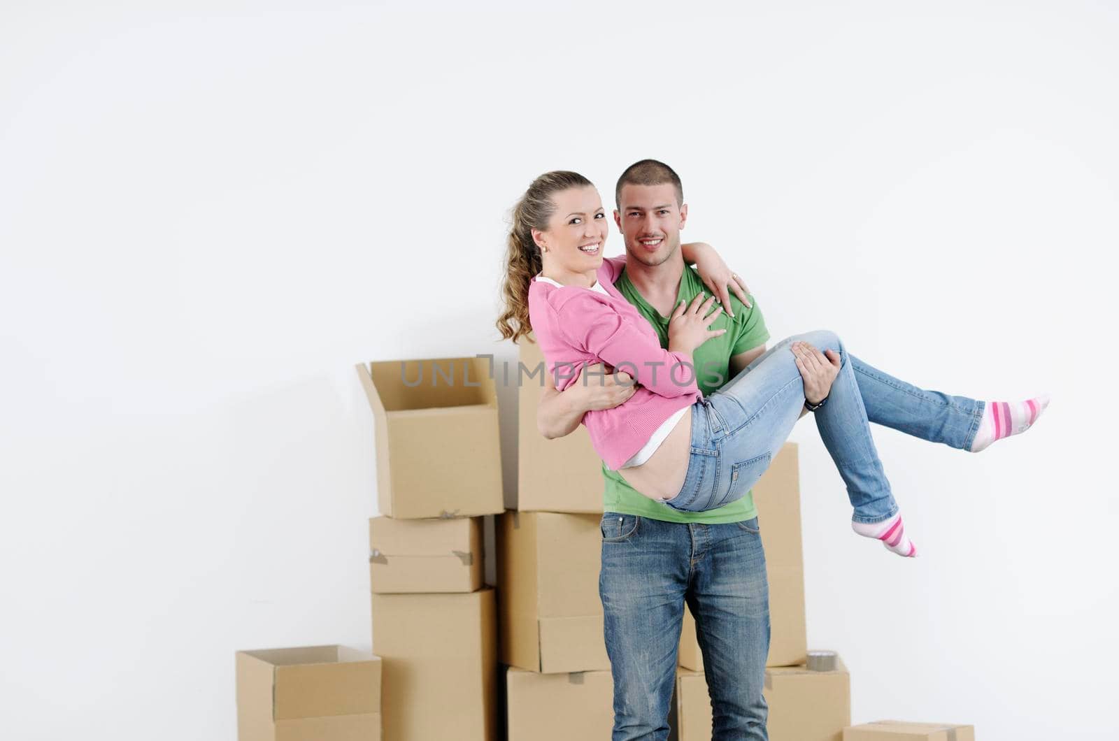 happy Young couple moving in new home