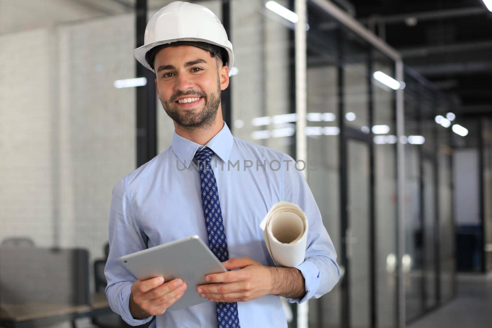 Shot of a engineer using a digital tablet on a construction site