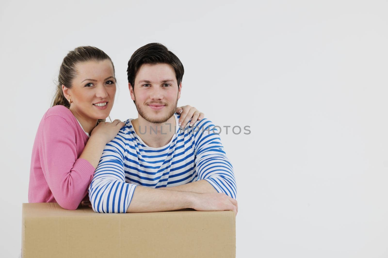 Young couple moving in new house by dotshock