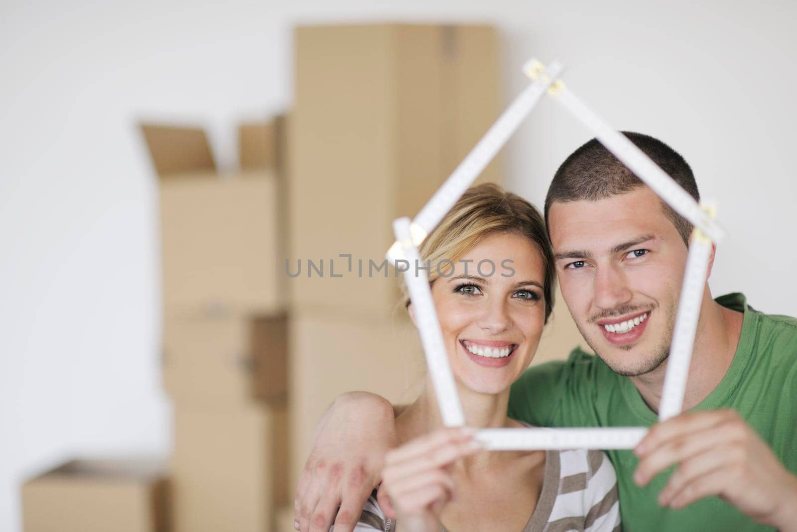 happy Young couple moving in new home