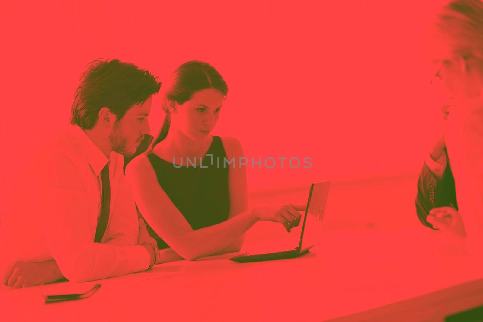 Group of happy young  business people in a meeting at office