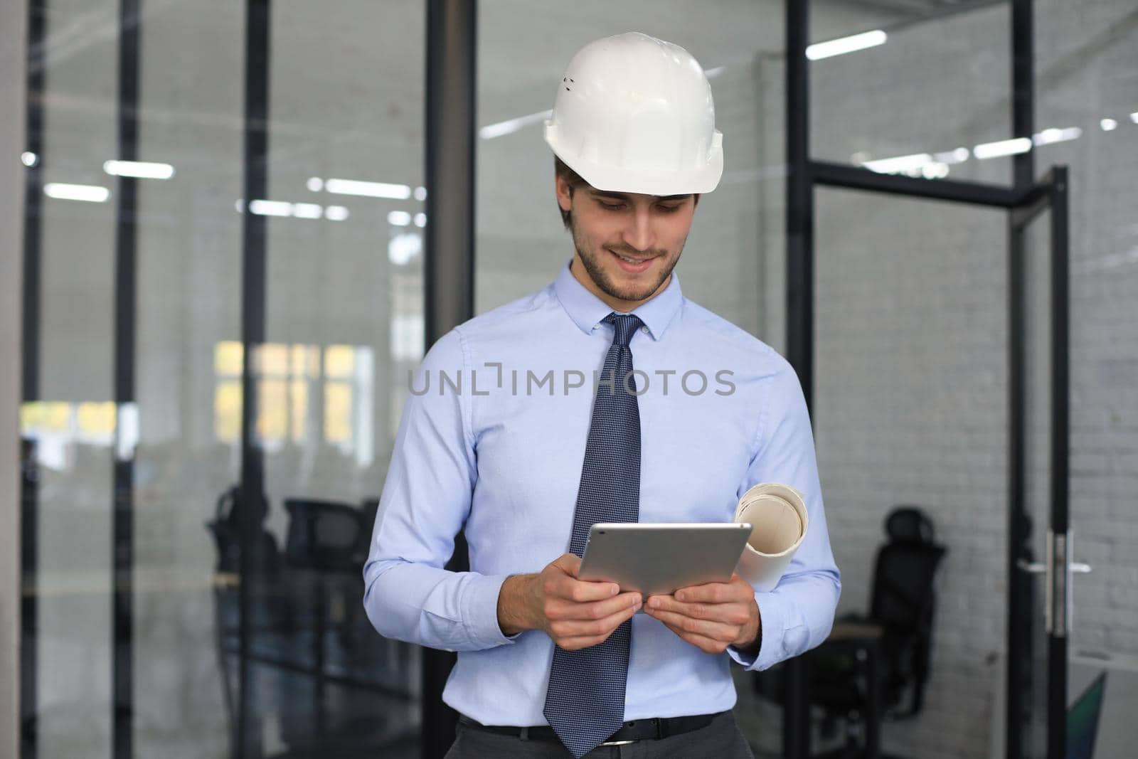 Shot of a engineer using a digital tablet on a construction site