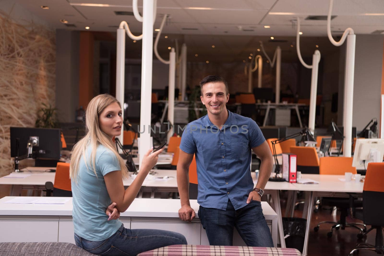 Portrait of startup business couple in a modern office