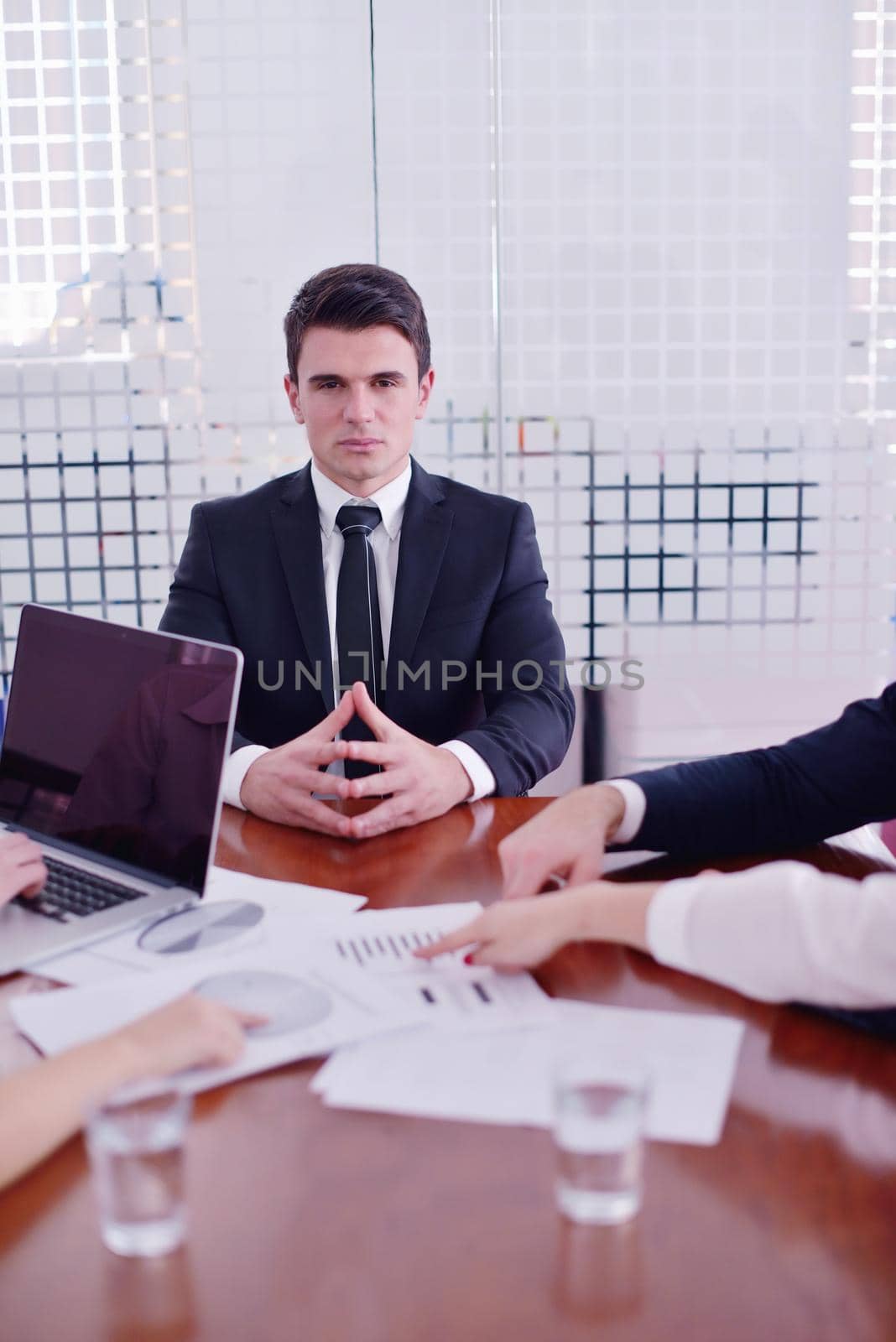 business woman  with her staff,  people group in background at modern bright office indoors