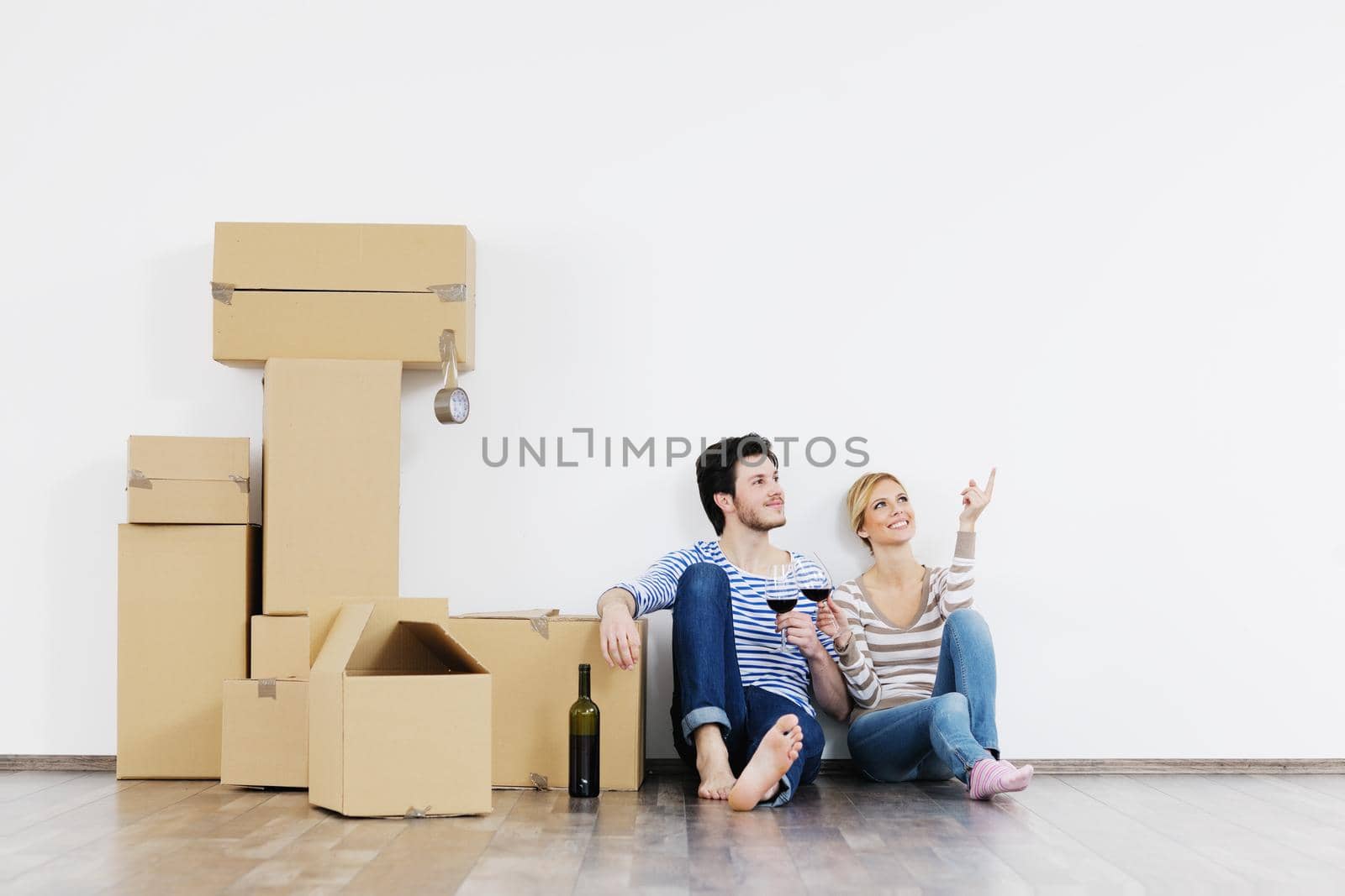 happy Young couple moving in new house