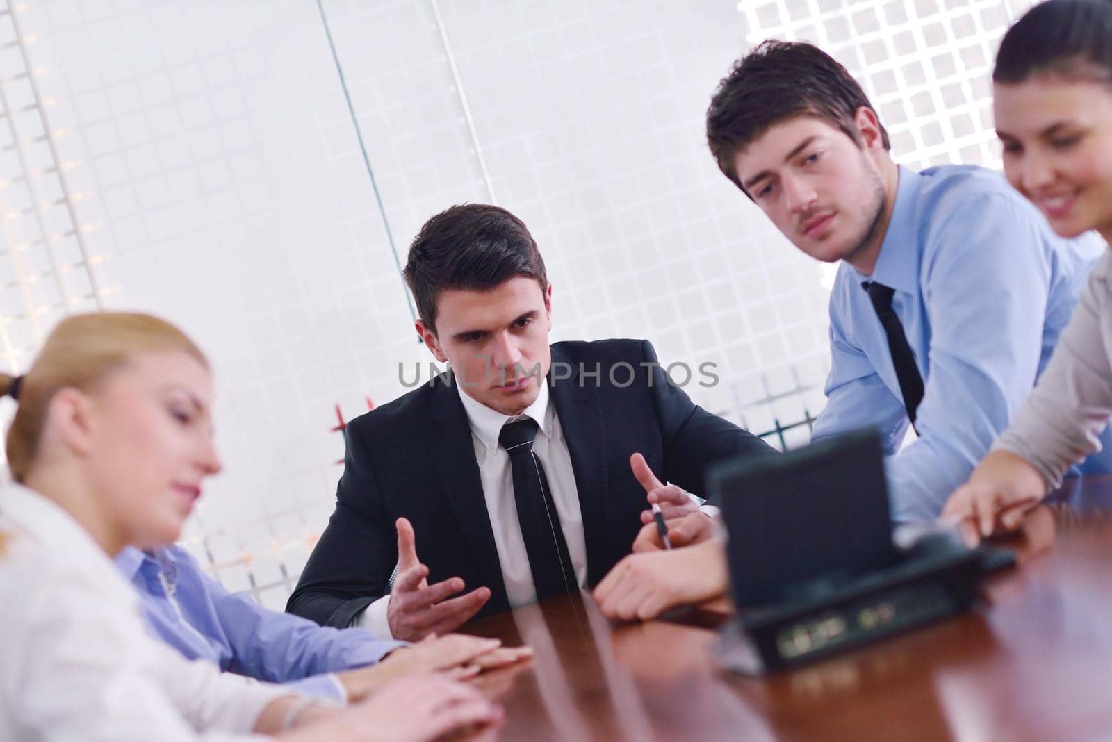 business people in a meeting at office by dotshock