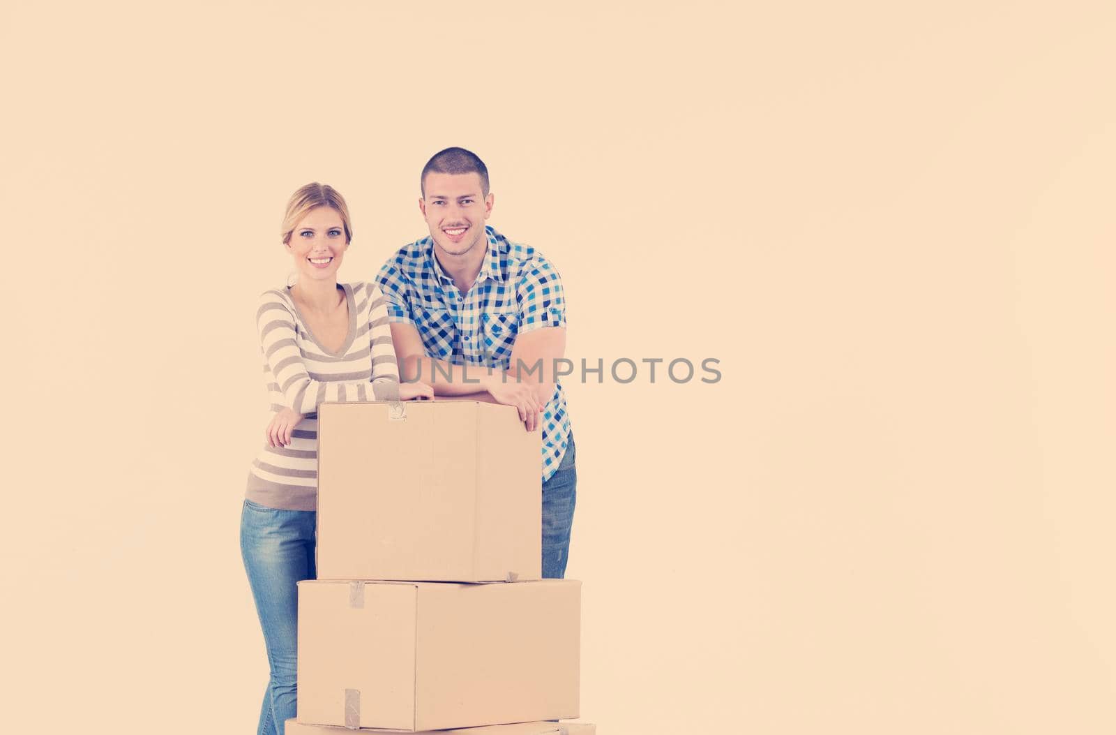 Young couple moving in new home by dotshock